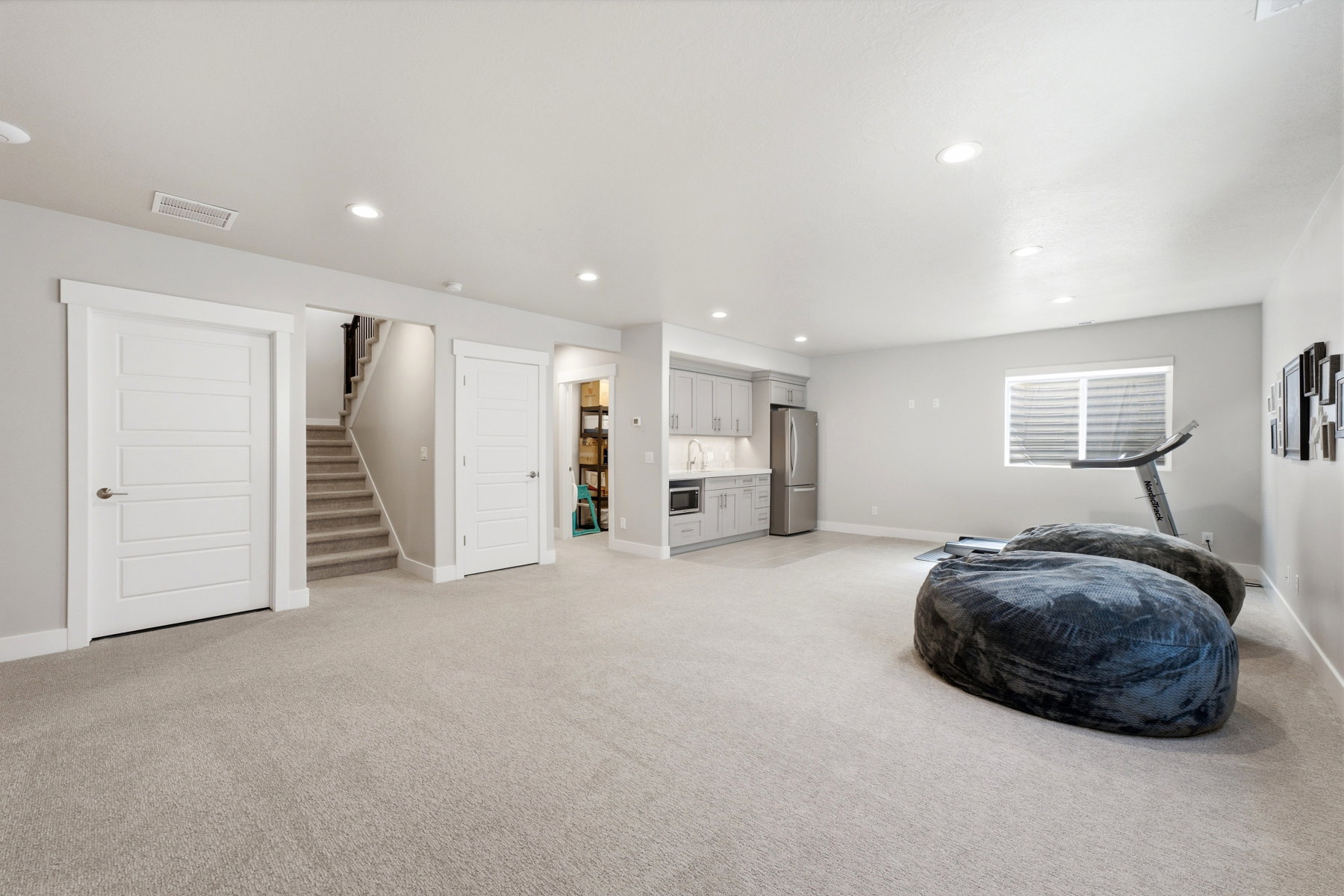 Lower level family room-view of ktichenette