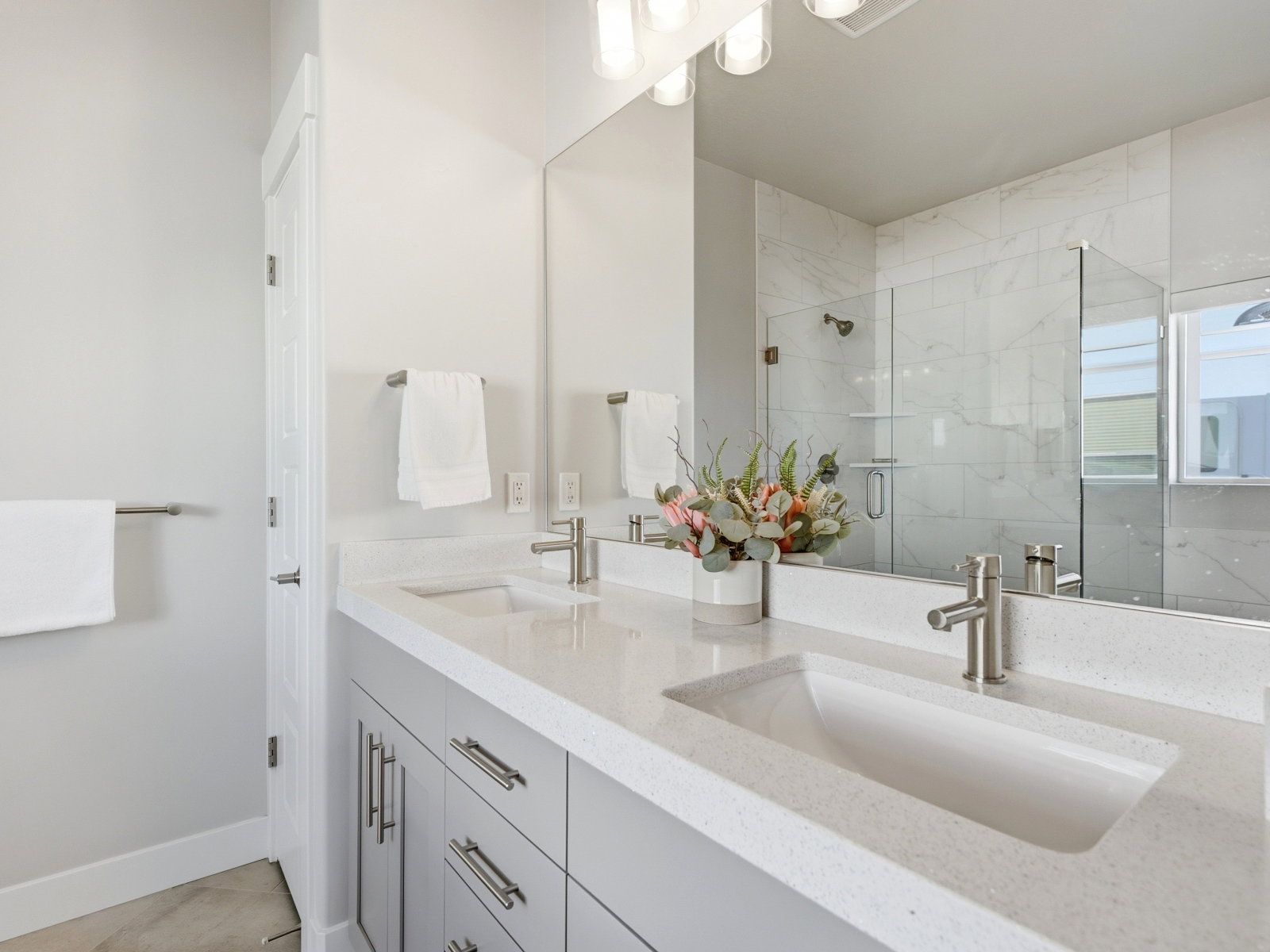 Primary bedroom en-suite with double sinks