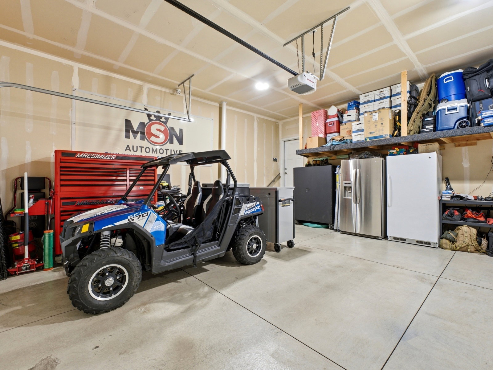 Spacious garage - view of door to interior