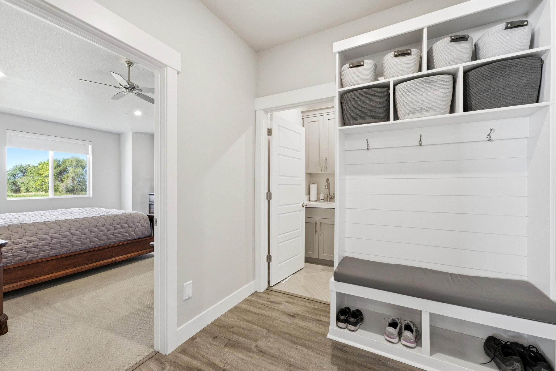 Mud-room with doorway to the laundry room
