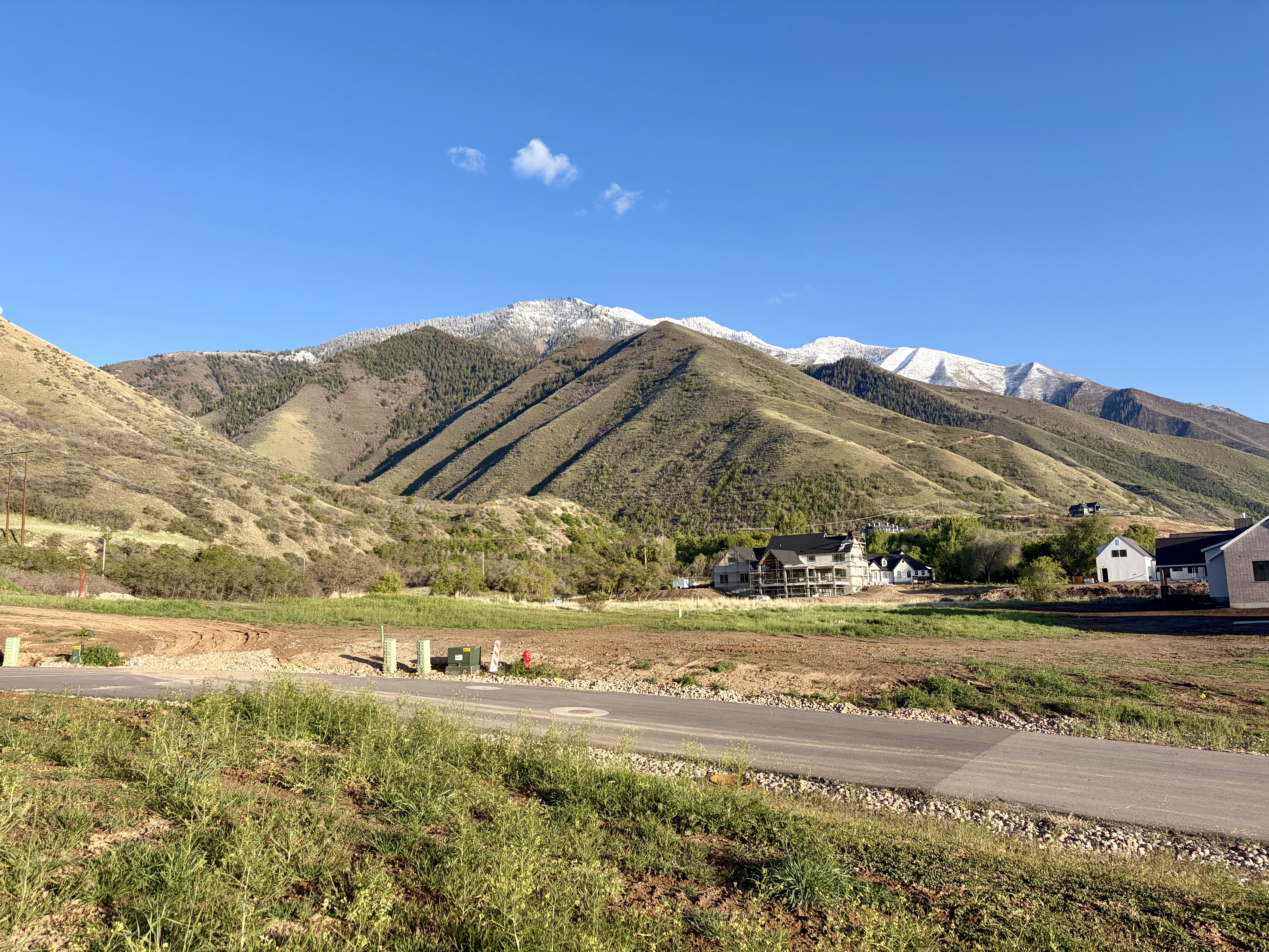 Mountain backdrop with snow-capped peaks