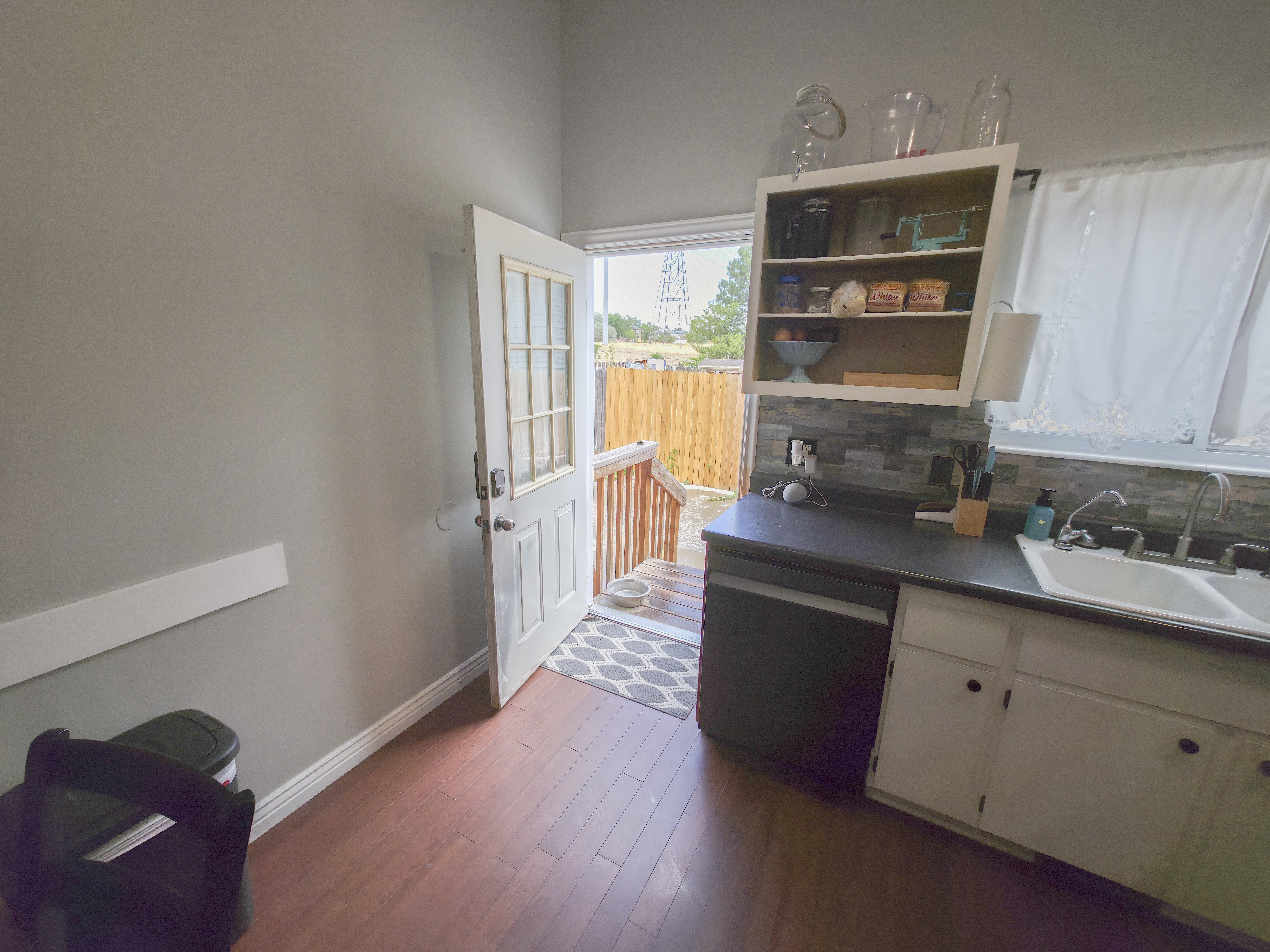 Side door to back yard from kitchen.