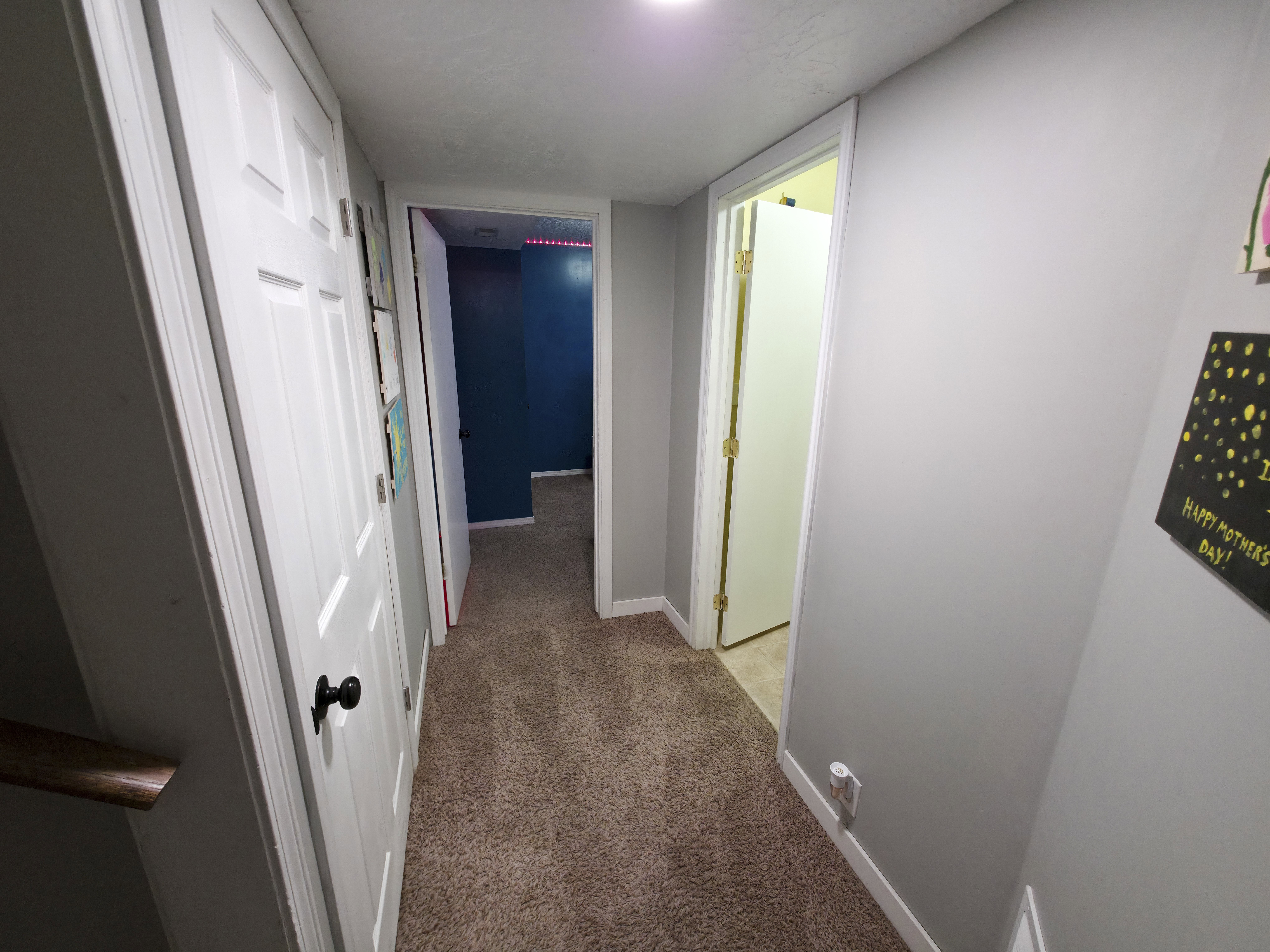 Stairs to basement 2 at left. Bedroom 4 center. Bathroom 2 on right.