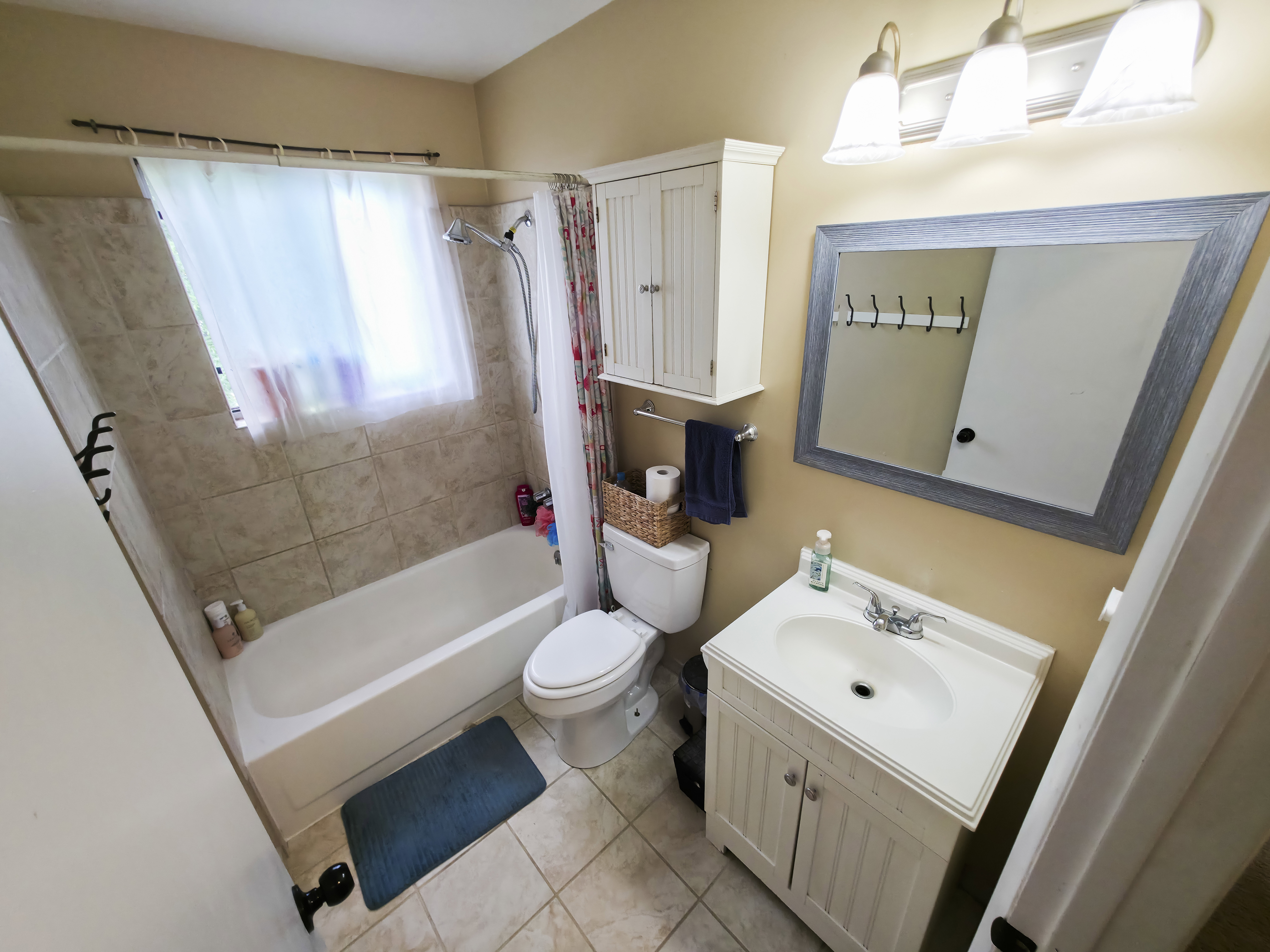 Bathroom 1: Tile & updates.