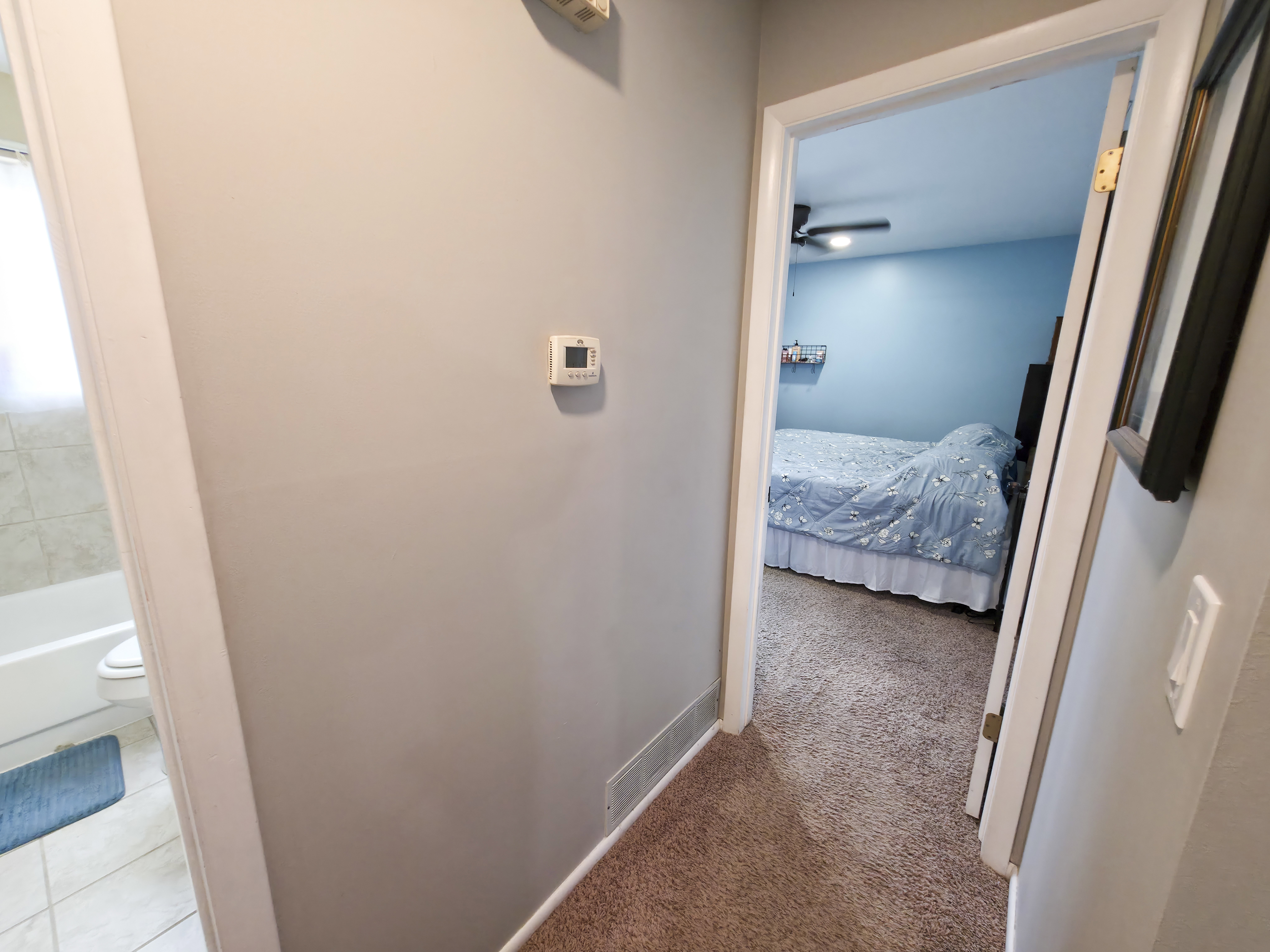 Level 2 thermostat is inactive. Primary bedroom on right.
