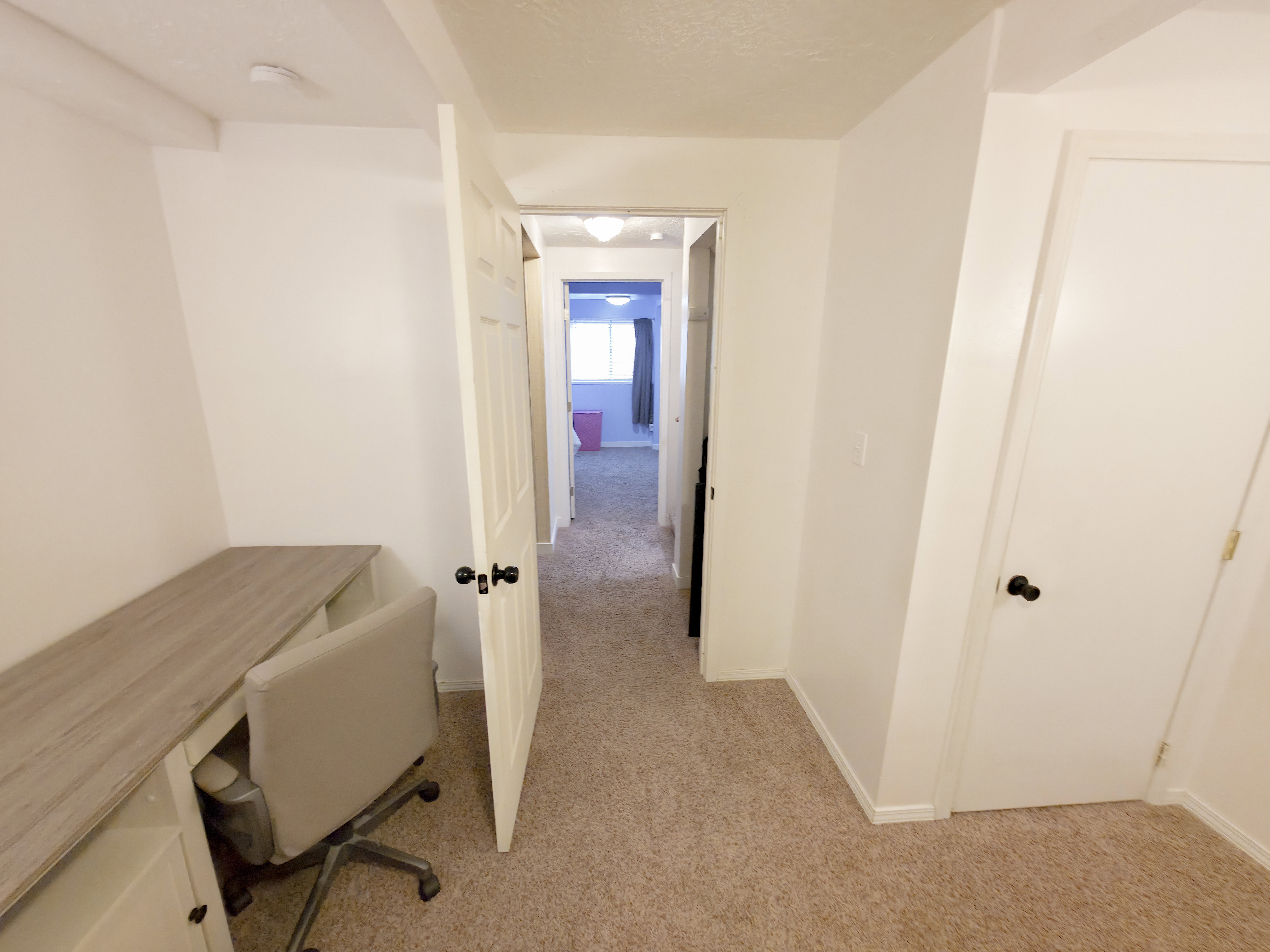 Hallway center, closet on right.