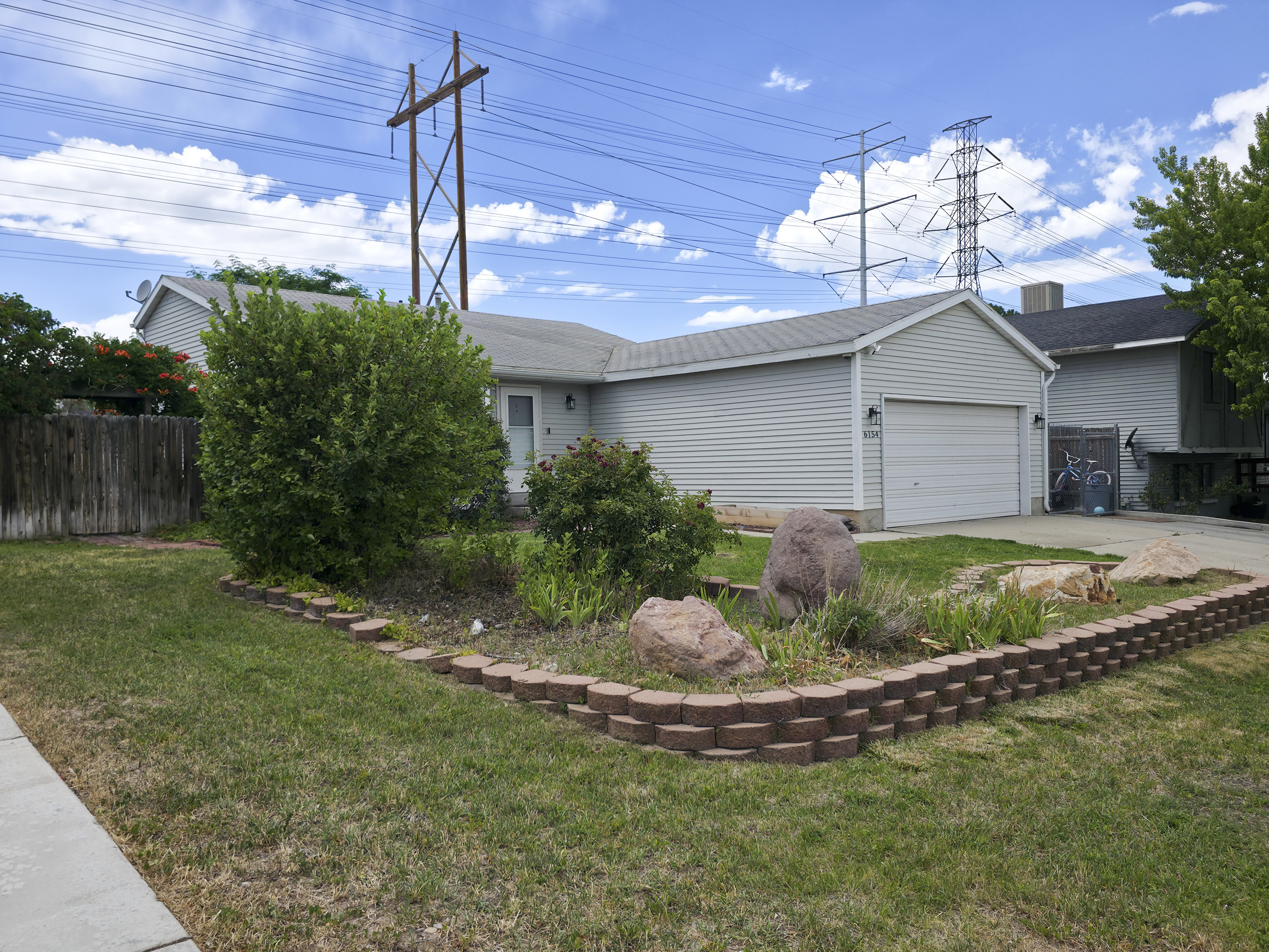 Terraced front yard with garden.