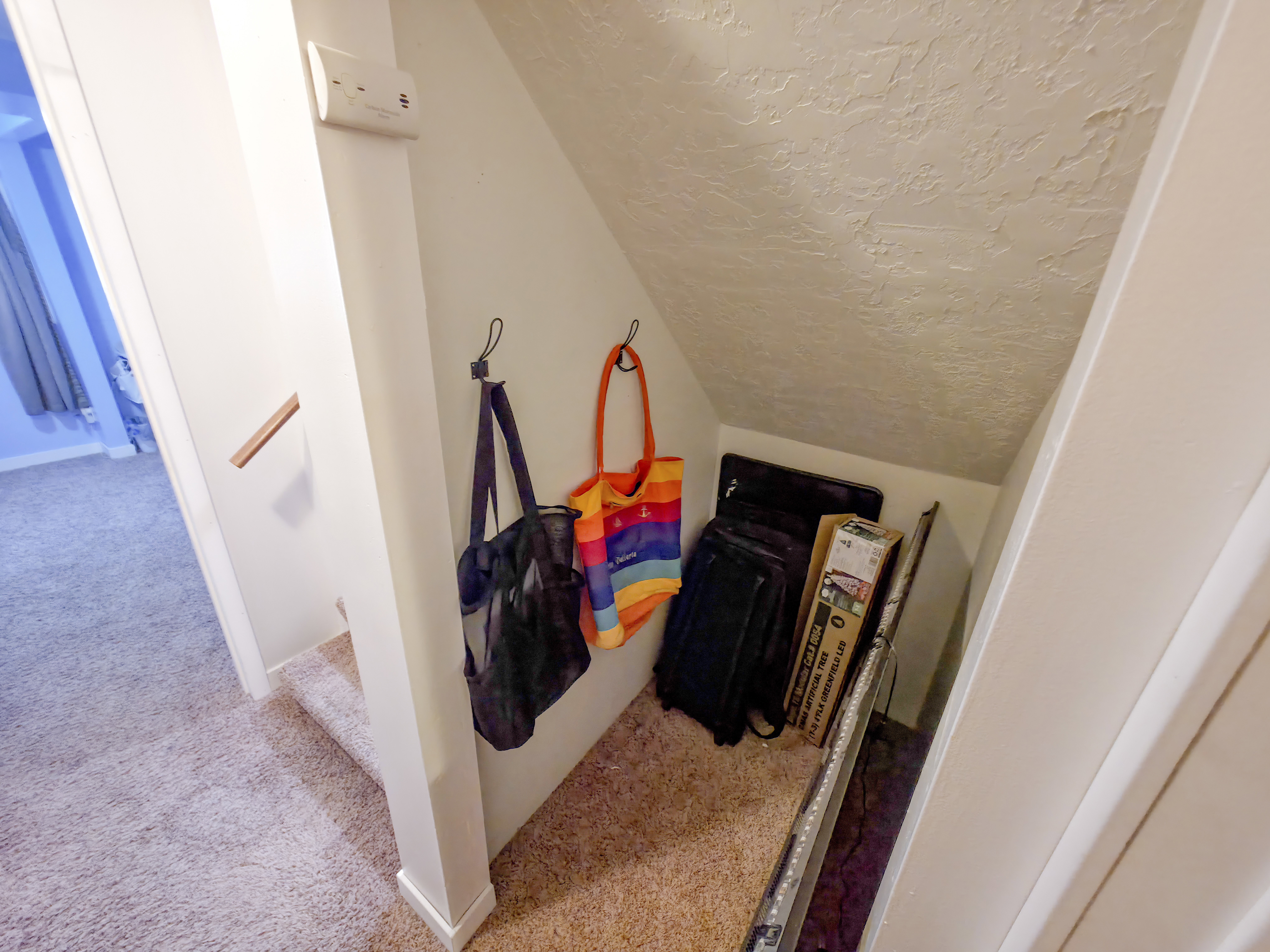 Under-stair alcove for storage.