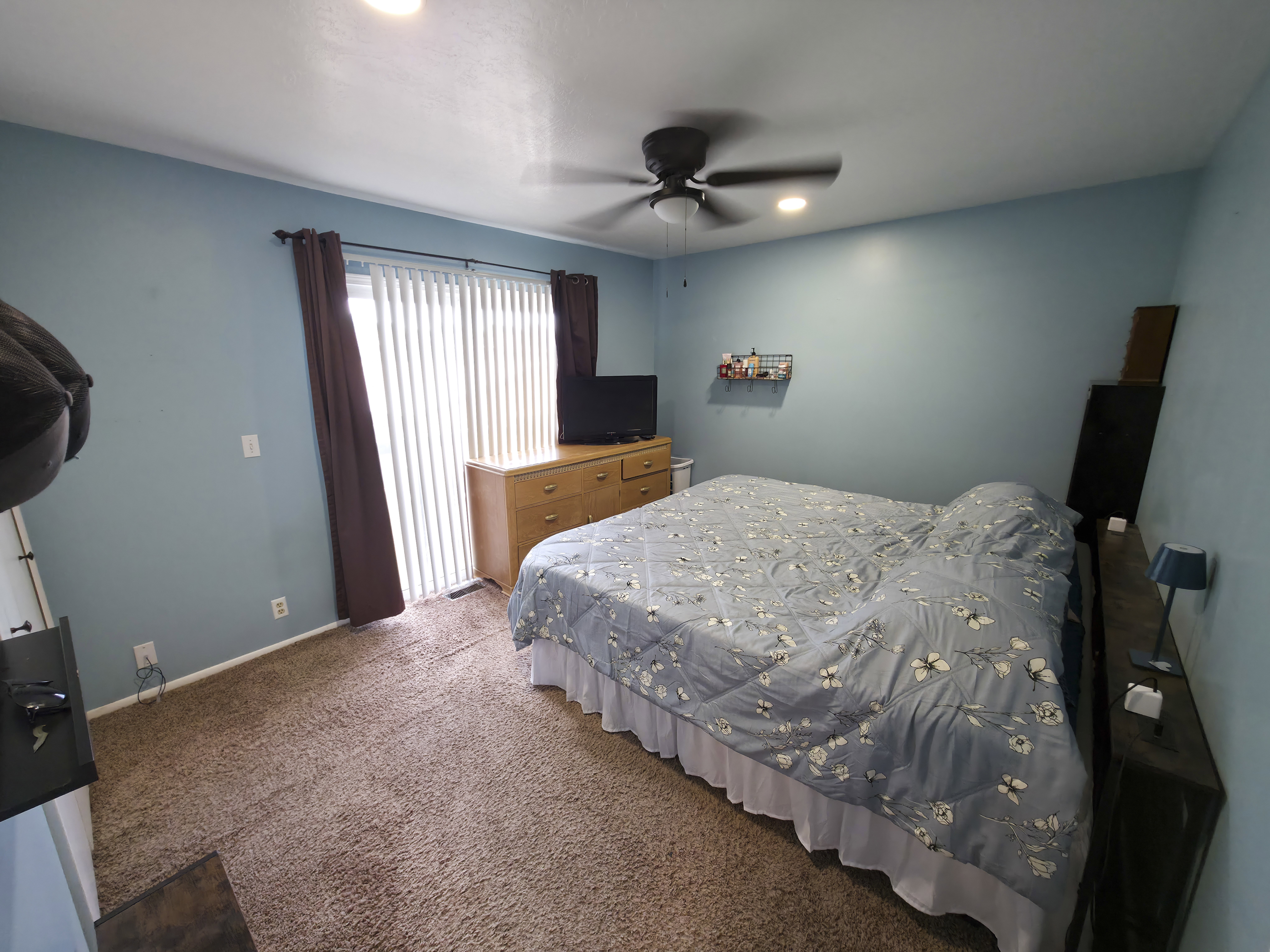 Primary bedroom. Sliding glass door view.