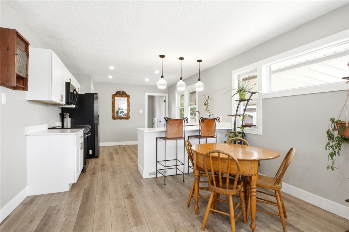 Newer vinyl windows & updated light fixtures.