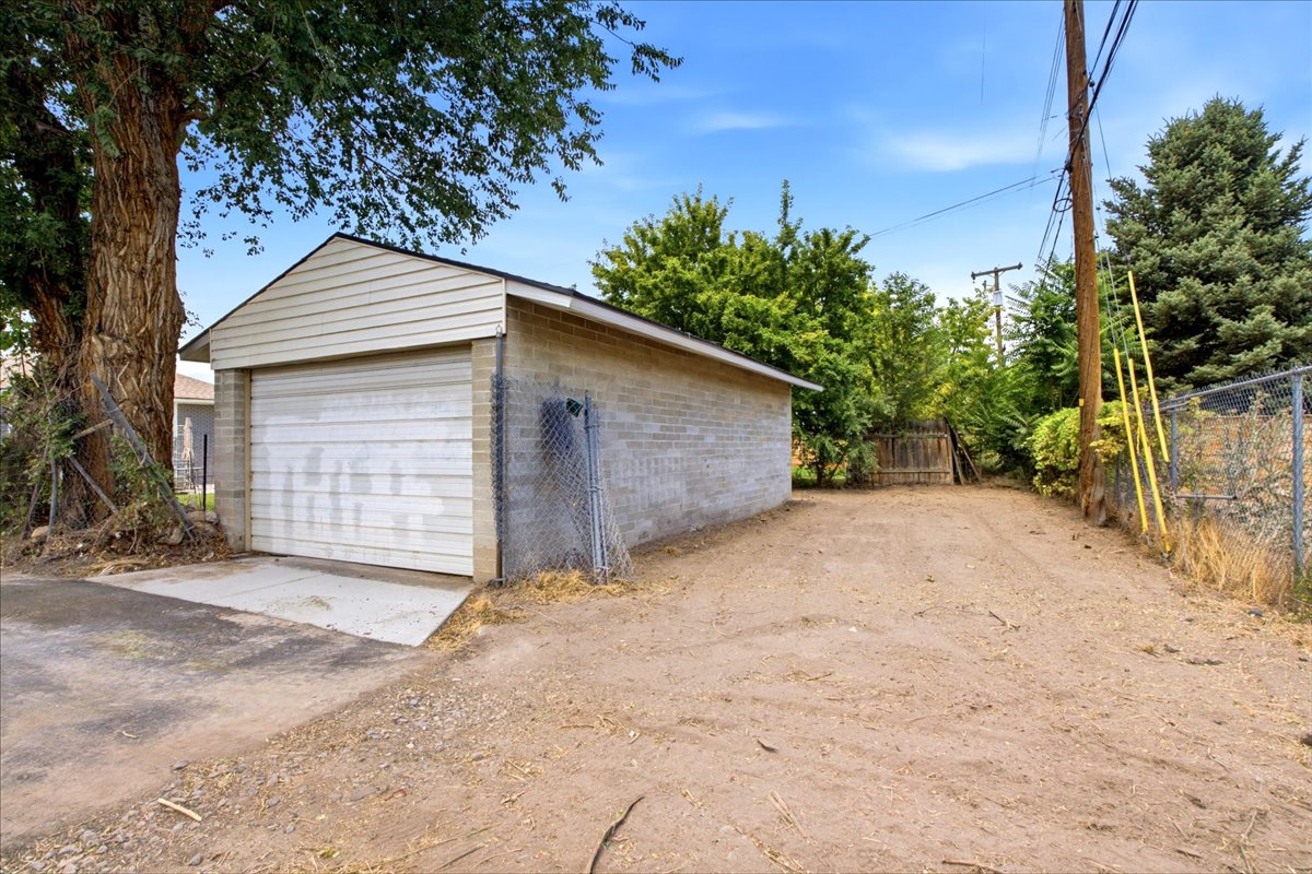 Parking and storage are exceptional, a rare find in this area, and include an oversized detached garage (approx. 32 feet deep with a 12-foot garage door,) with paved access & electrical service, a covered carport & additional driveway parking, RV/trailer