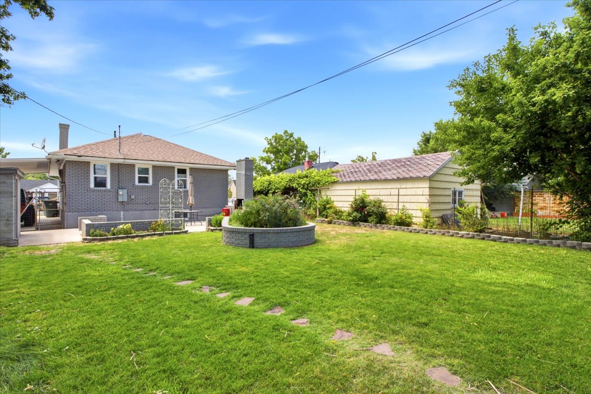 .17 acre lot with programmable sprinkler system with separate front and rear irrigation zones.