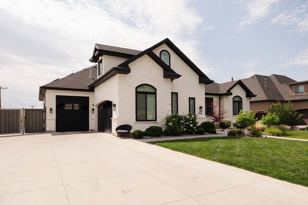 White brick facade with dark trim accents