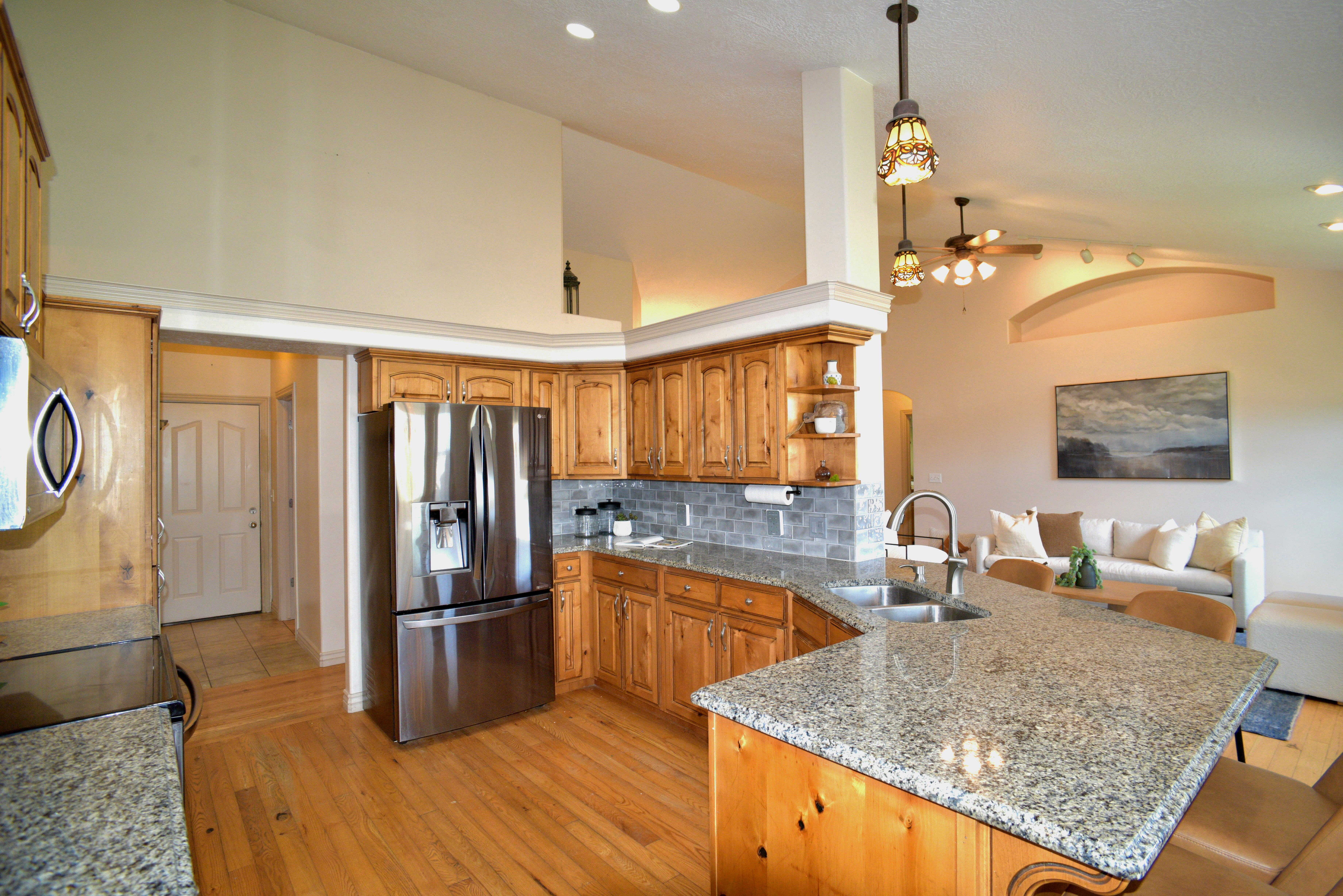 KITCHEN AND DINING WITH HARDWOOD FLOORS
