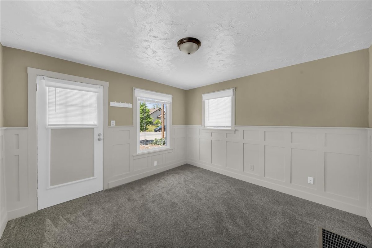 Board and batten wainscoting with a neutral paint scheme
