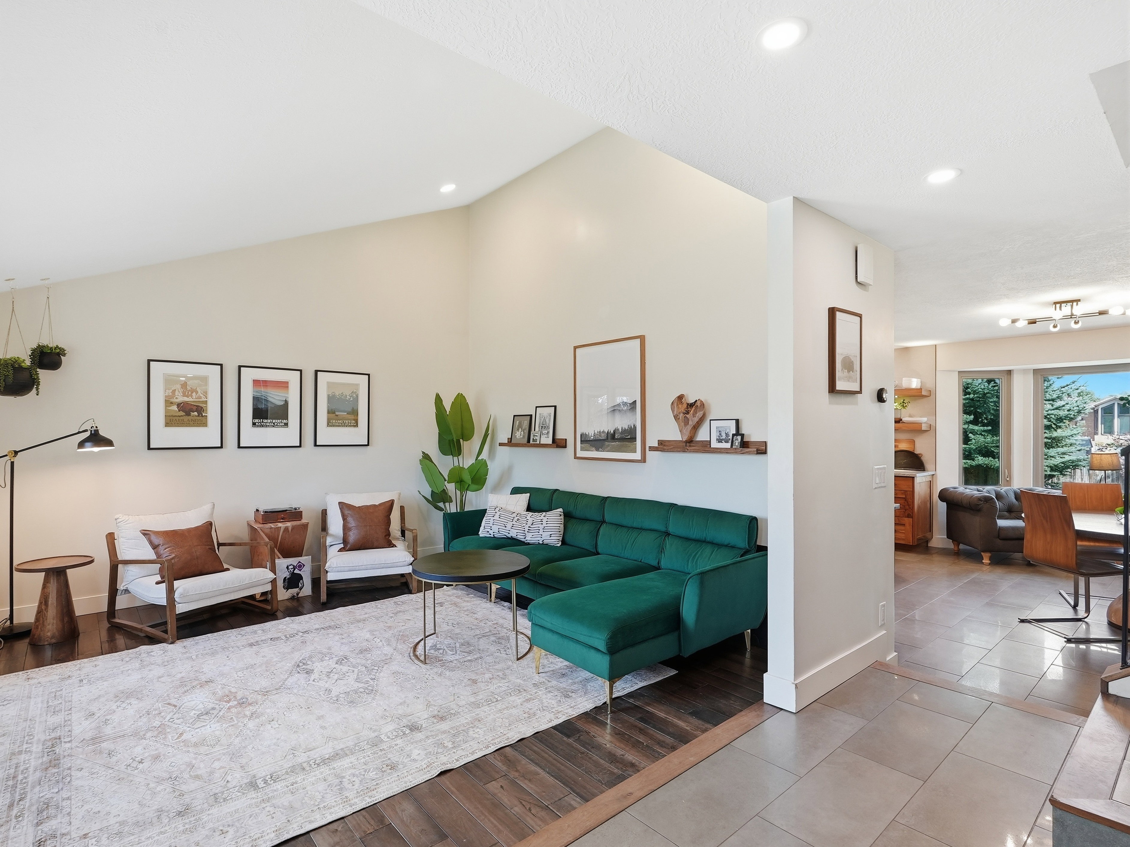 Vaulted ceiling living area featuring recessed lighting