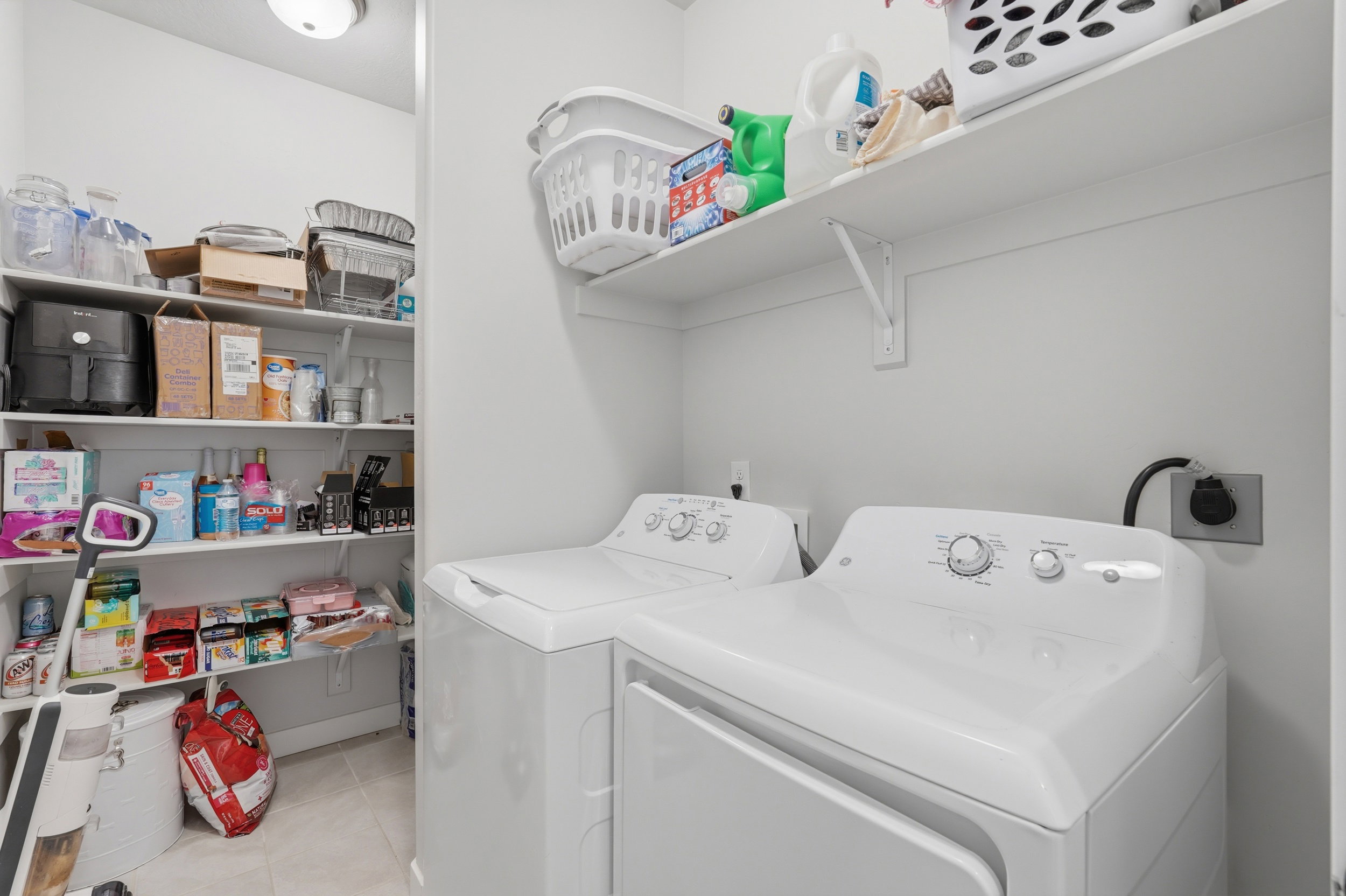 Walk in pantry and washer and dryer