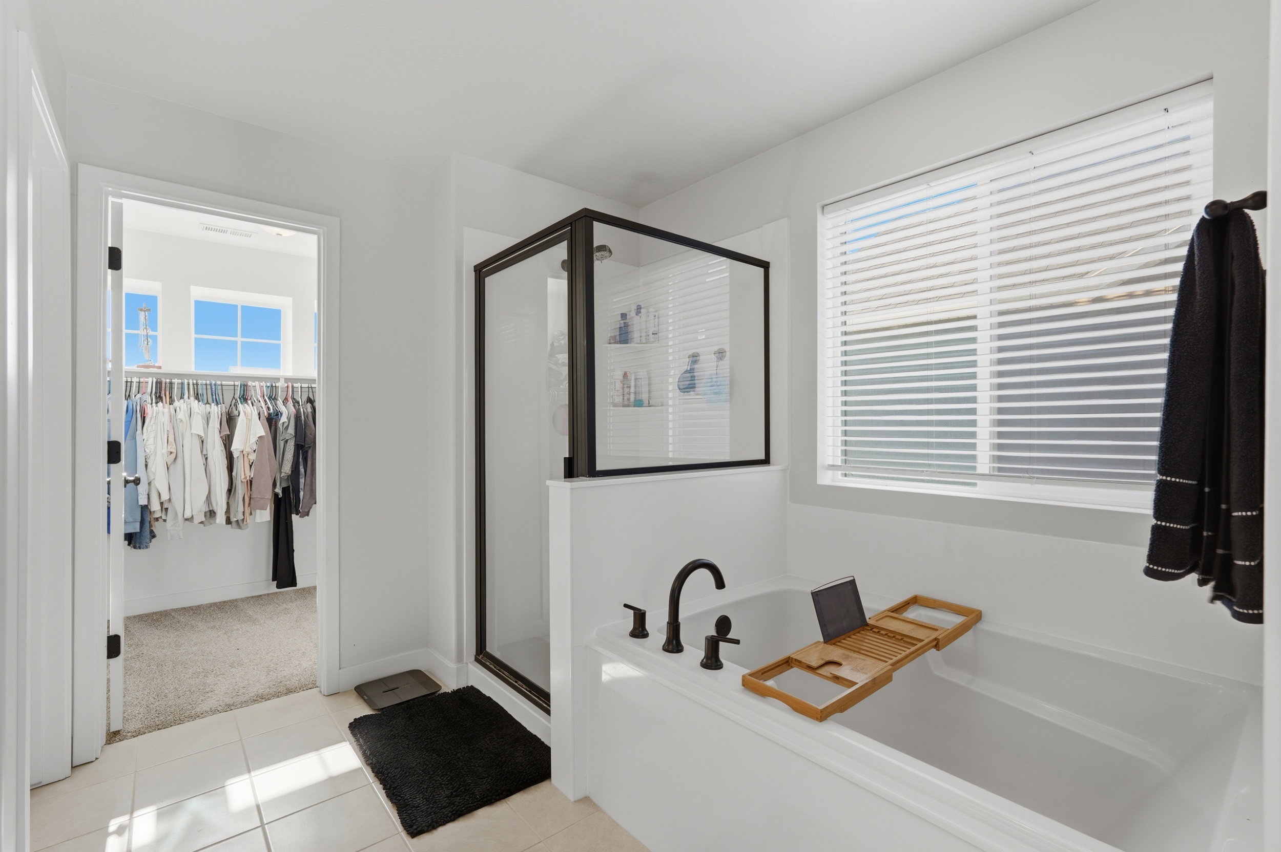 Primary Bathroom with Large Soaker tub and luxurious glass shower