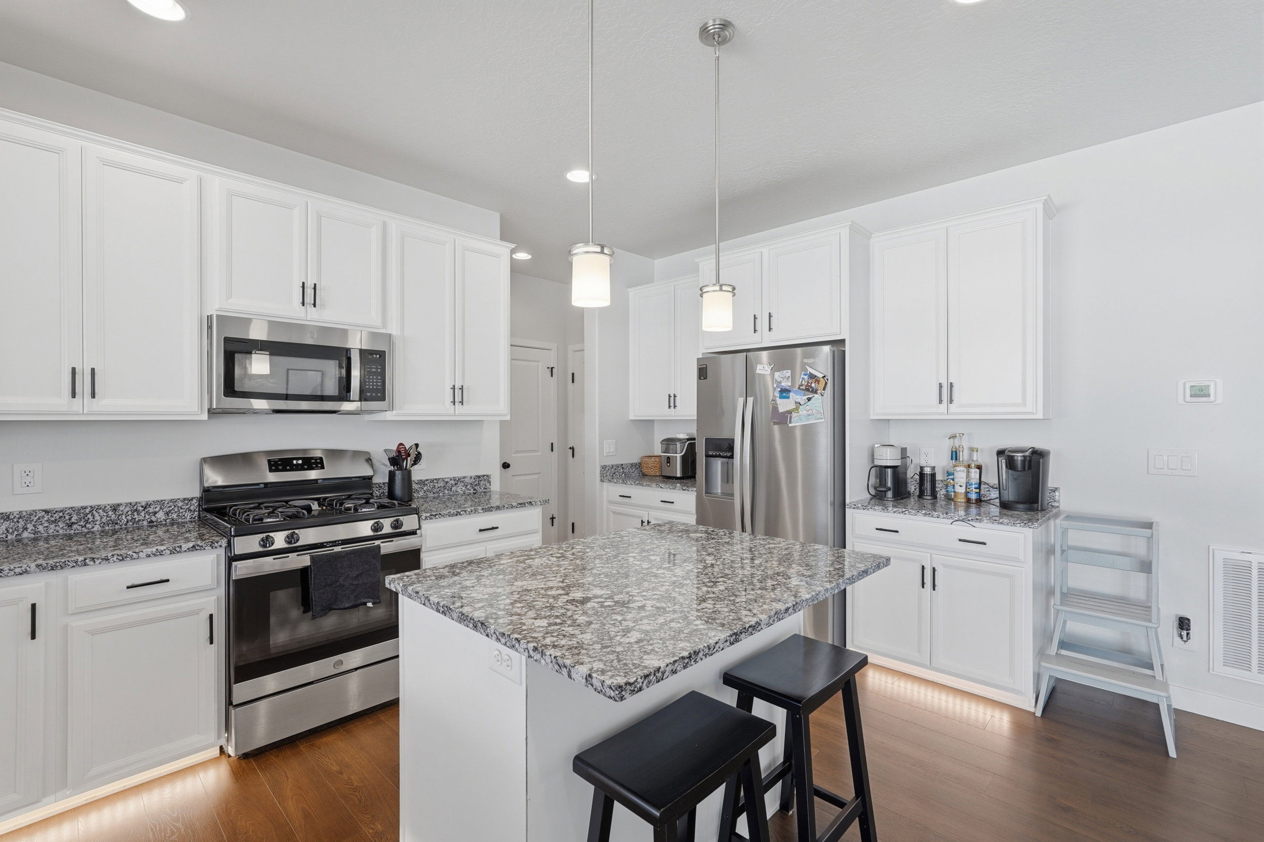 Kitchen, with upgraded counter tops, under cabinets  lights, soft-close-cabinets and gas range