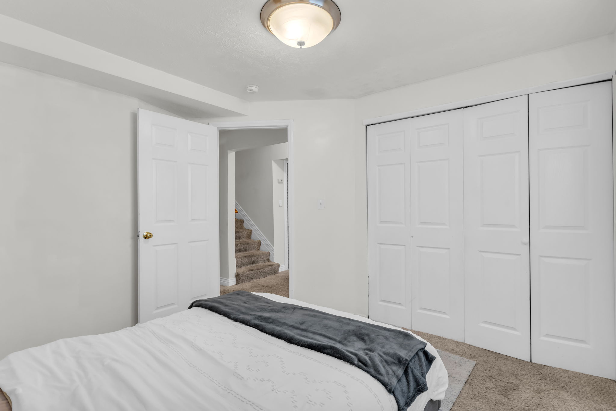 Room featuring neutral wall finishes and wall-to-wall carpeting