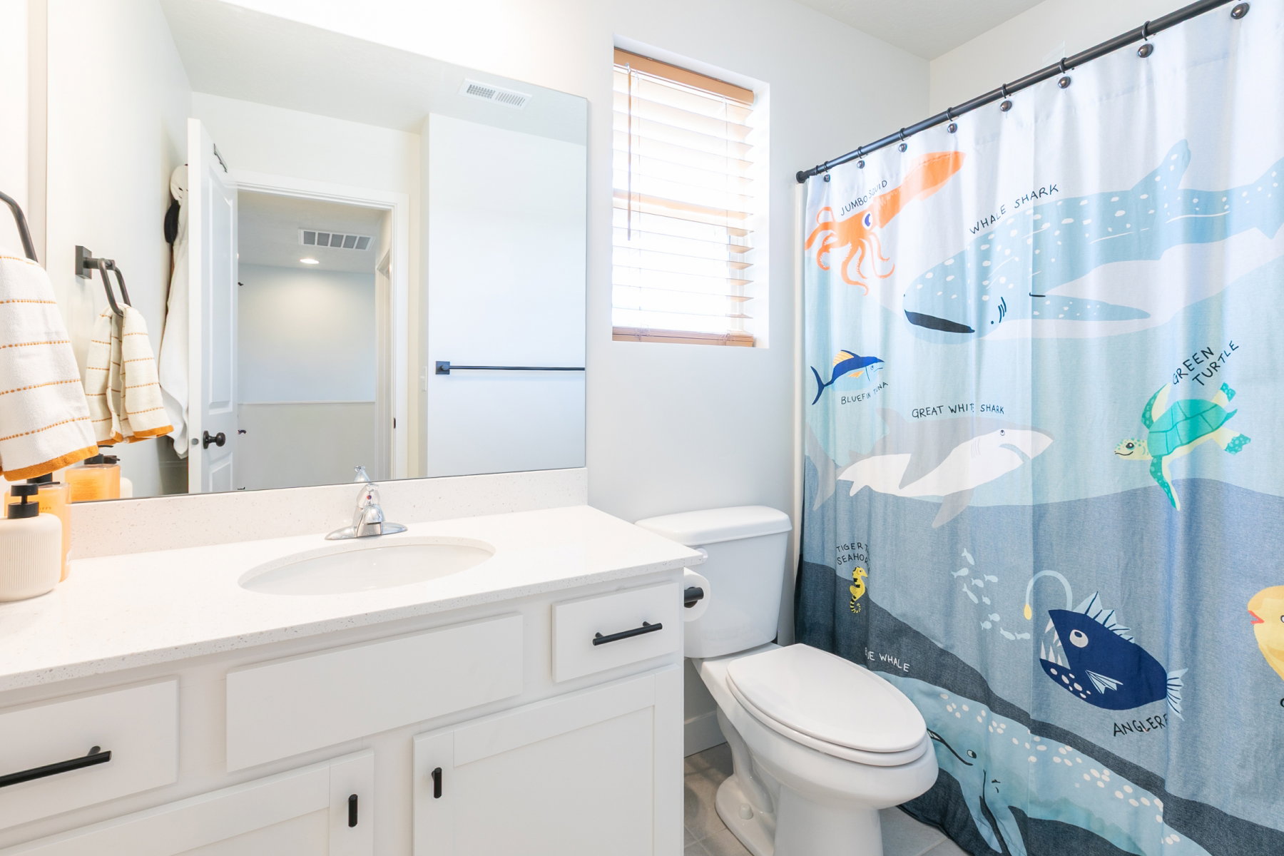 Main bath with upgraded fixtures.