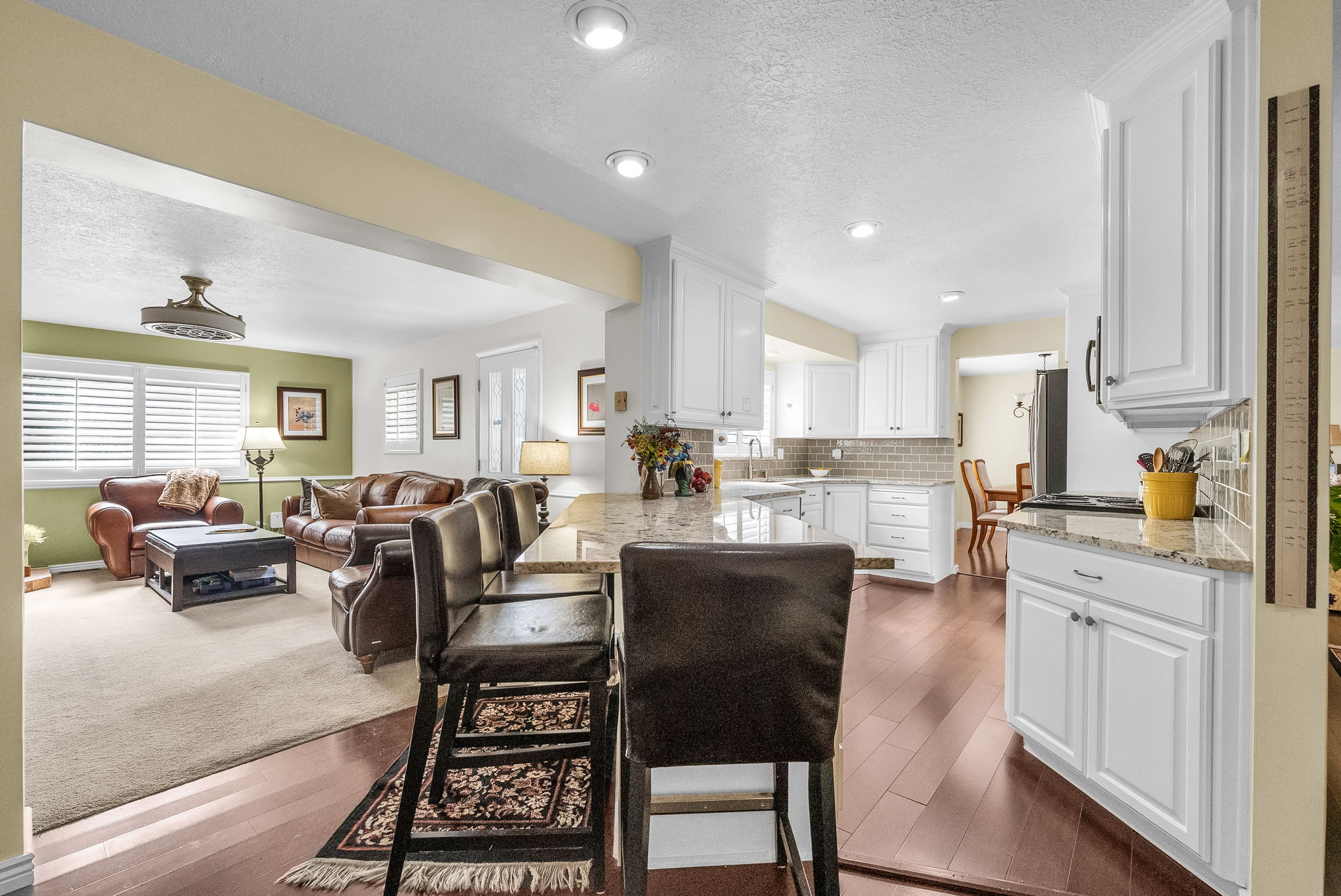 The thoughtful redesign of this kitchen allows for a fabulous breakfast bar!