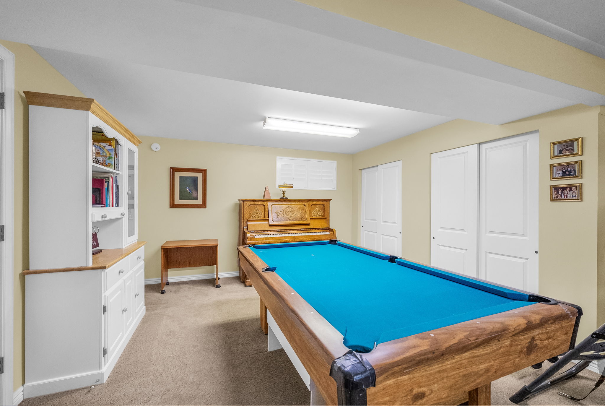 Versatile bonus room area off the recreation room.  Pool table included.