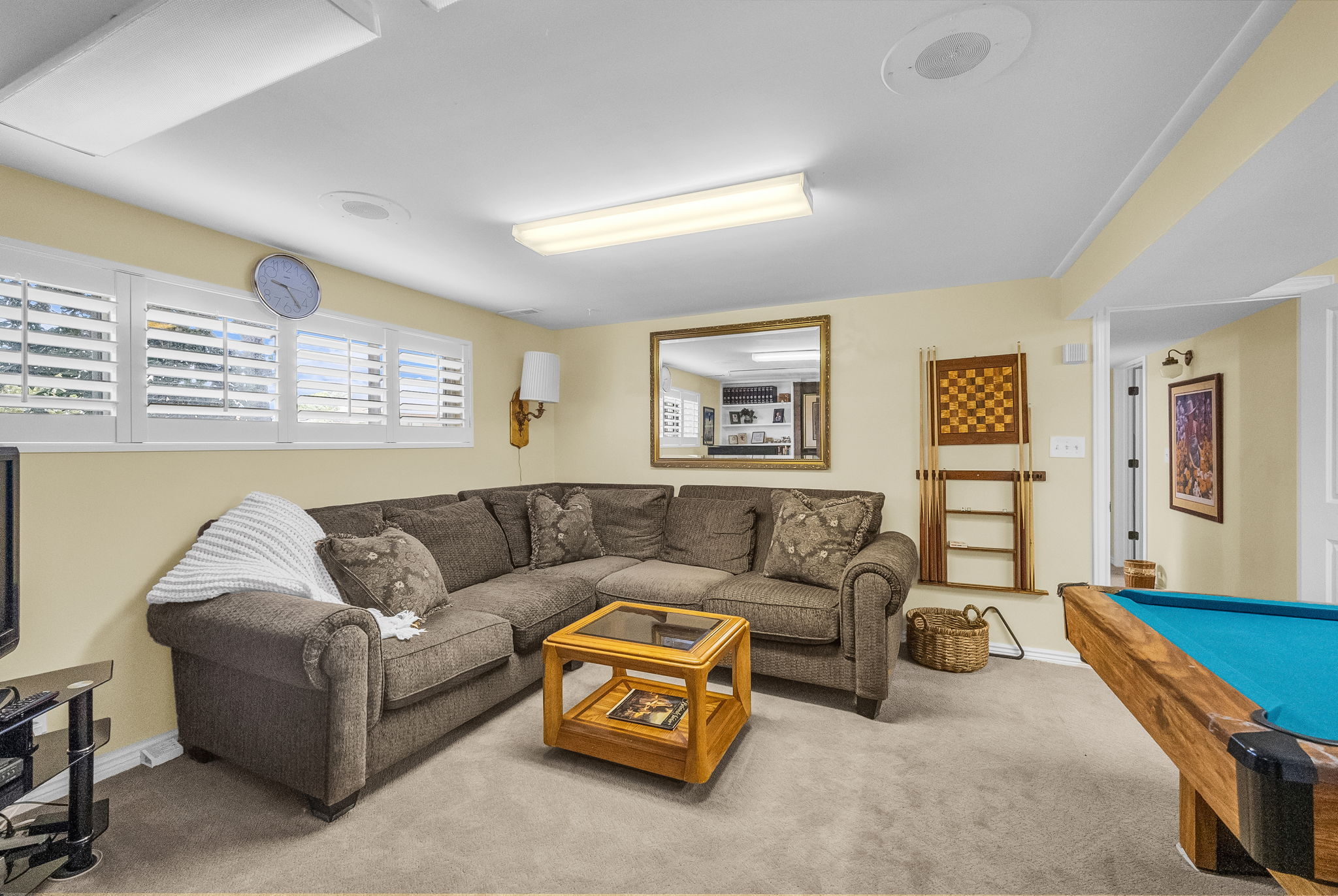 Recreation room featuring carpet flooring and recessed lighting