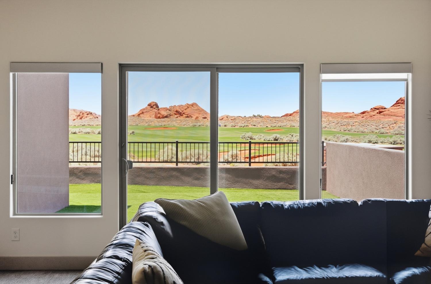 Expansive sliding glass doors provide access to an outdoor area