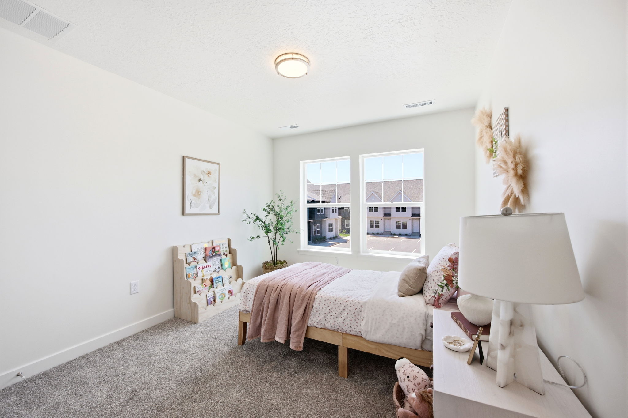 Bedroom featuring twin windows, light-colored walls, recessed lighting, and grey carpeting