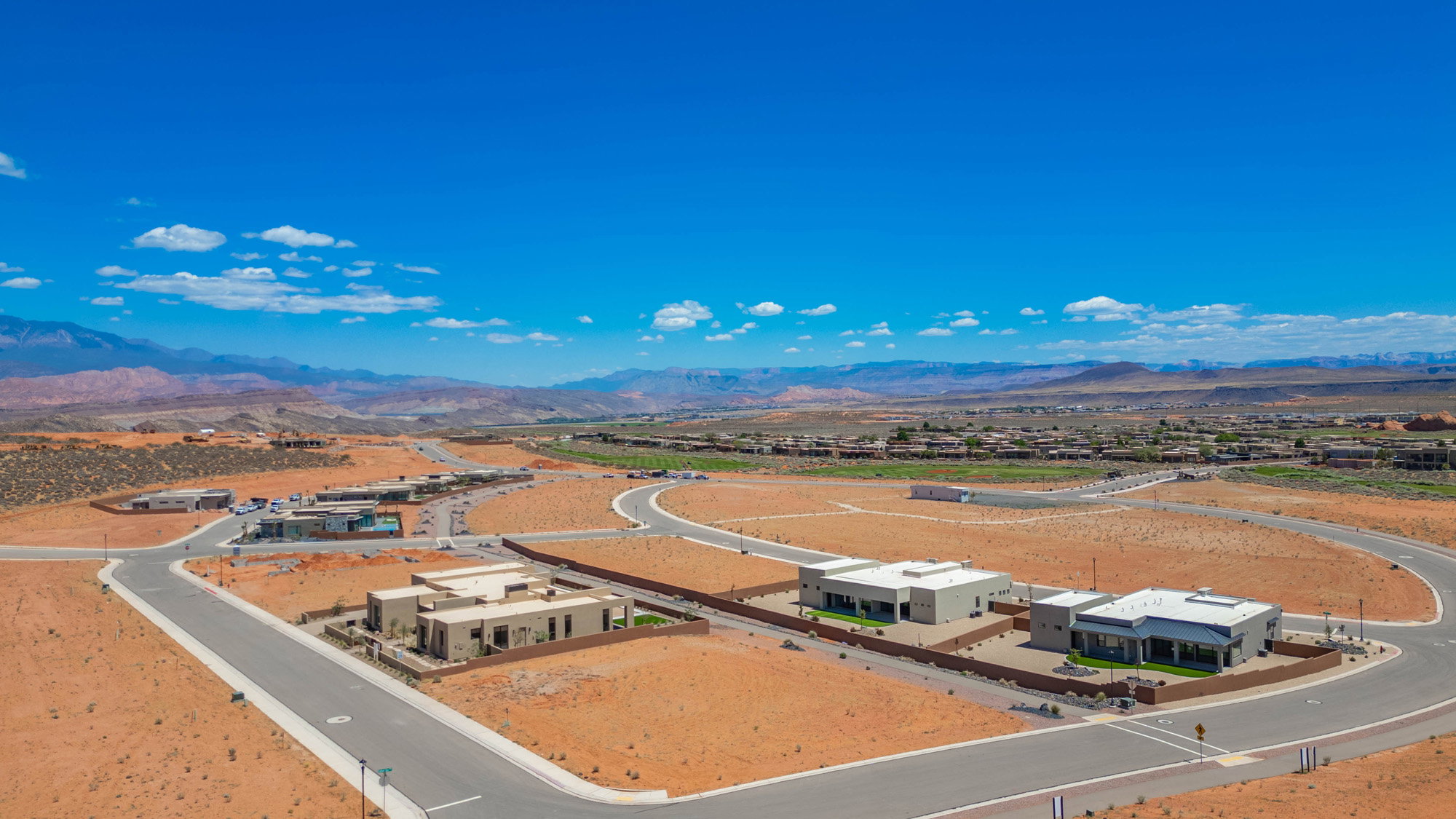Newly developed community featuring modern architecture and expansive desert lots