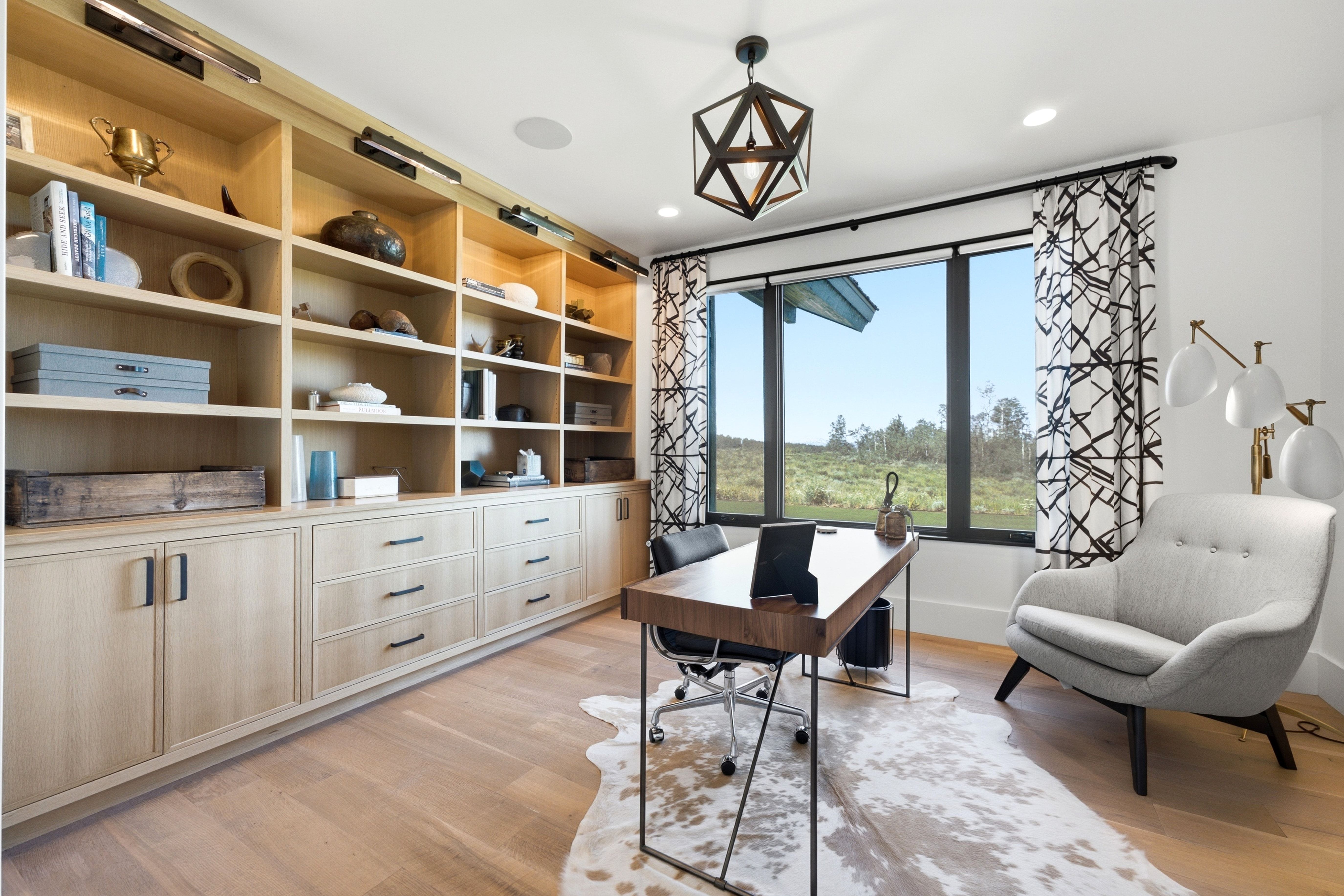 Custom built-in shelving with integrated cabinetry and drawers