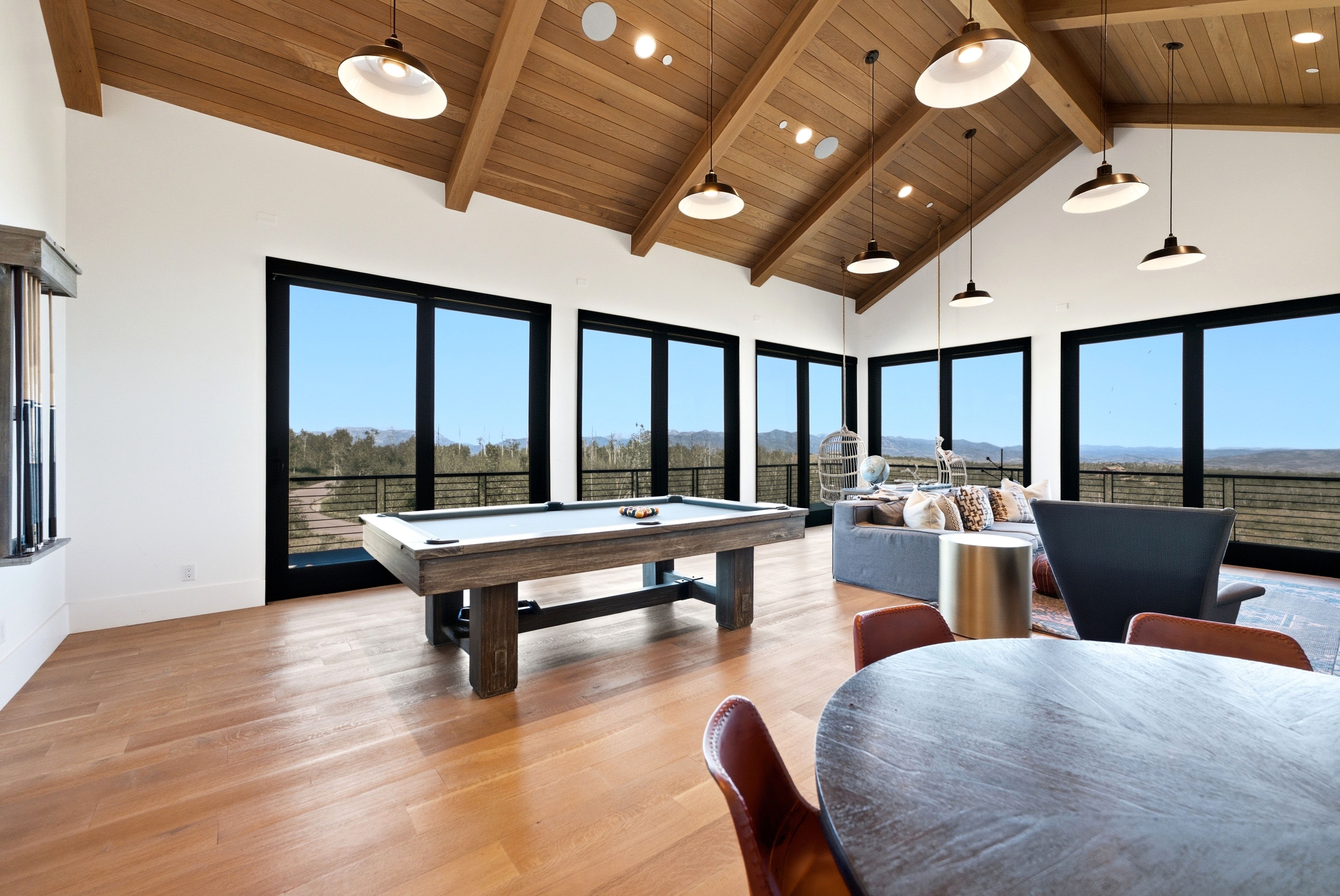Vaulted wood-plank ceiling with exposed beams