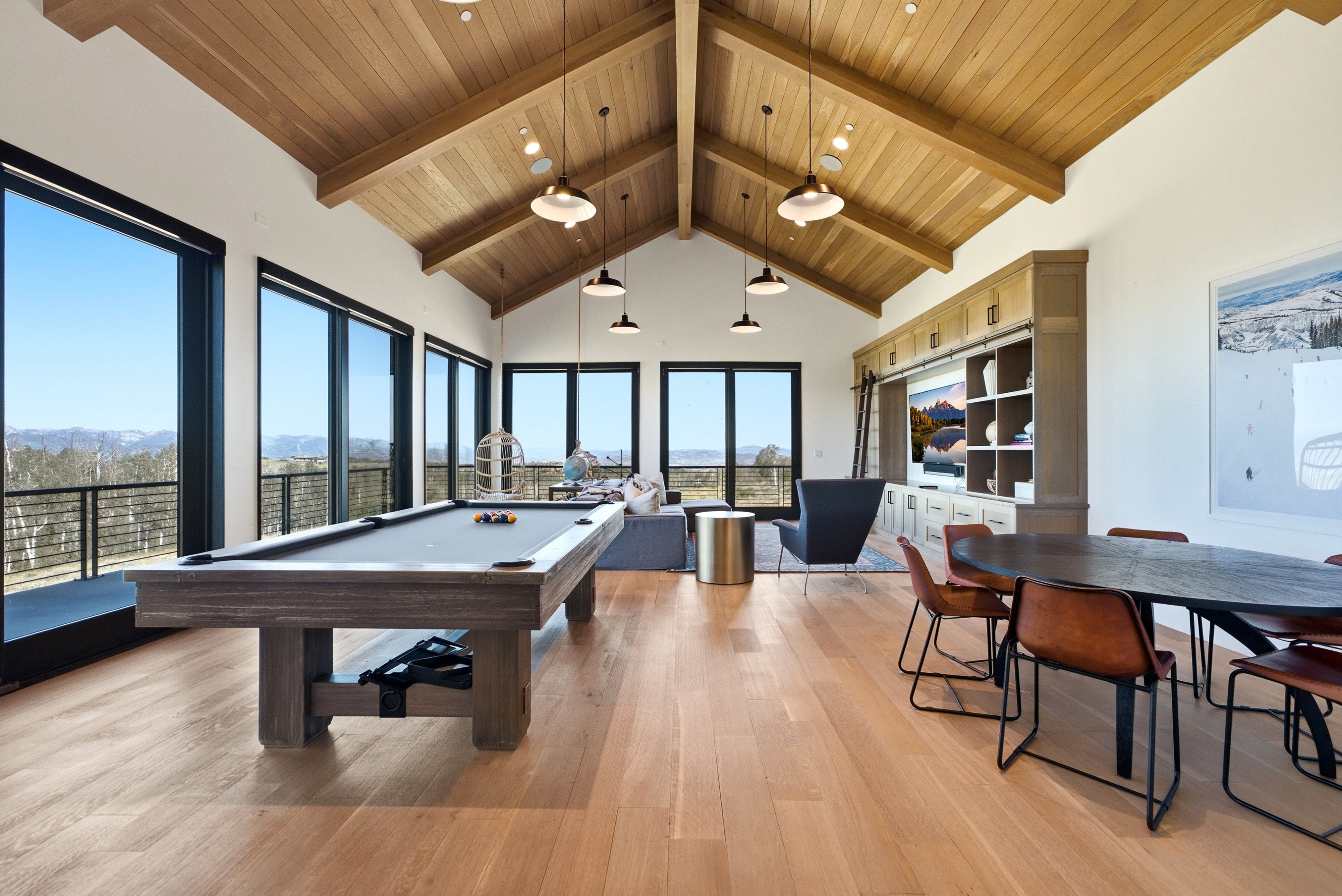 Vaulted wood-paneled ceiling with exposed beams