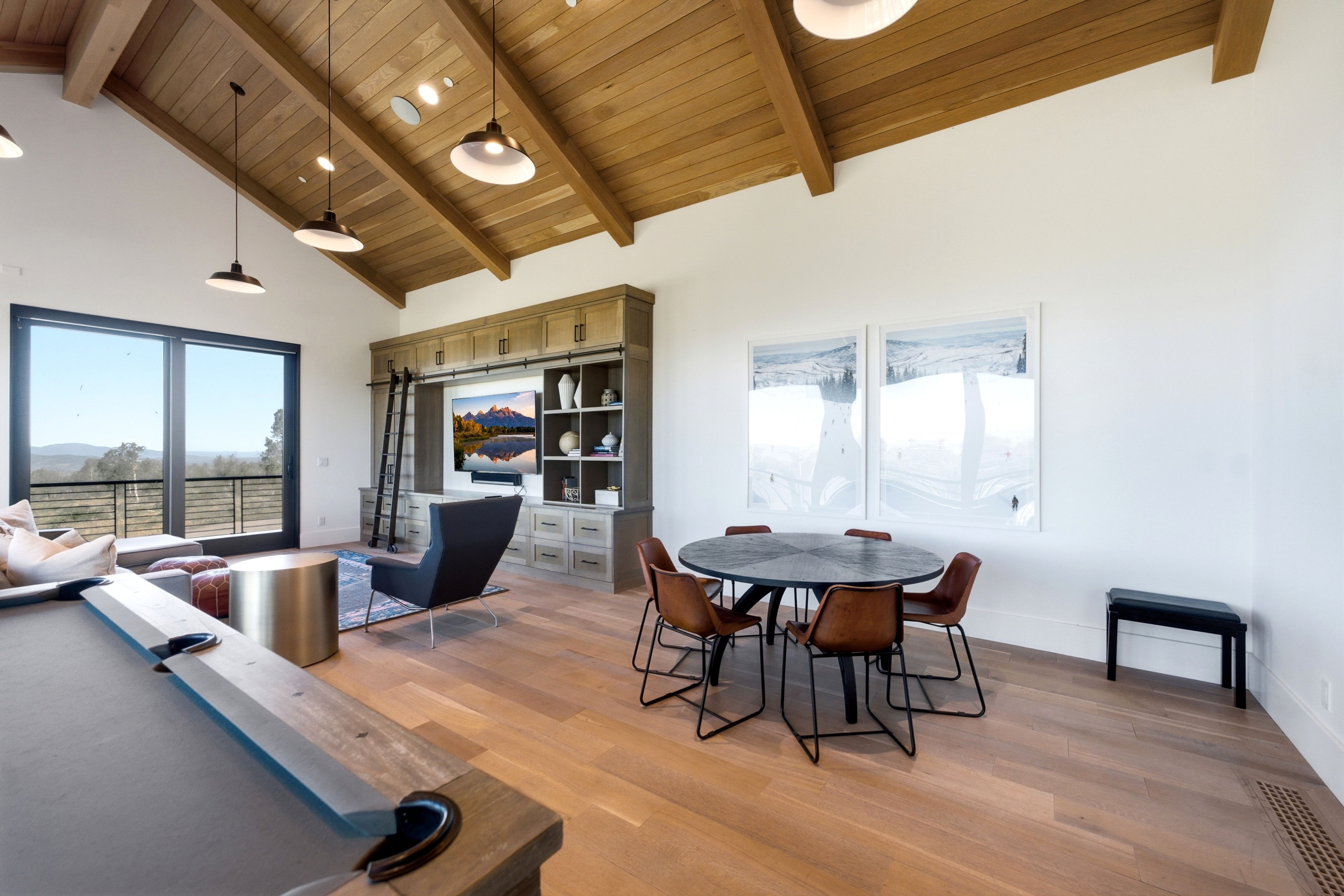 Vaulted wood-paneled ceilings with exposed beams