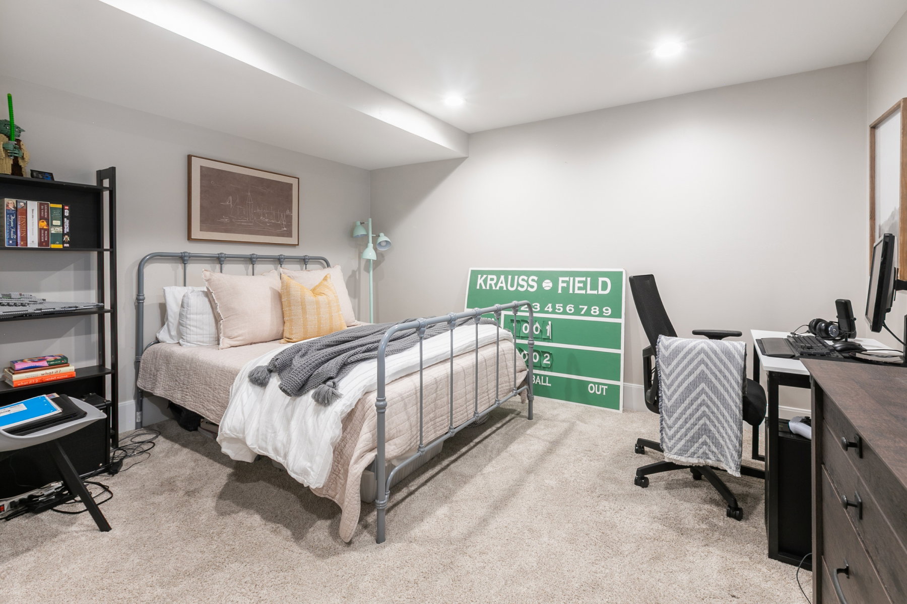 Carpeted room featuring recessed lighting, a built-in ceiling soffit, and painted walls