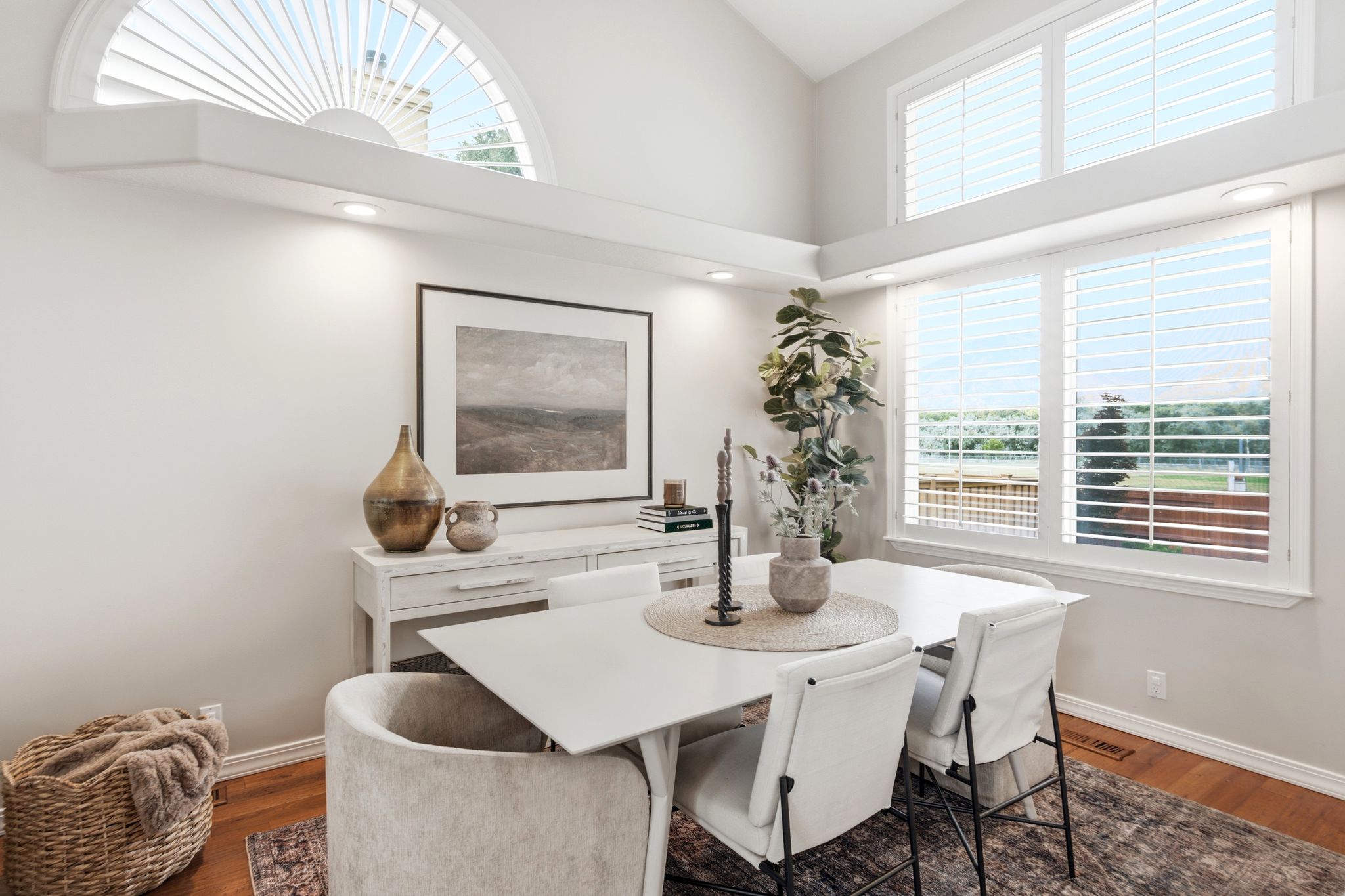 Vaulted ceiling with an arched transom window