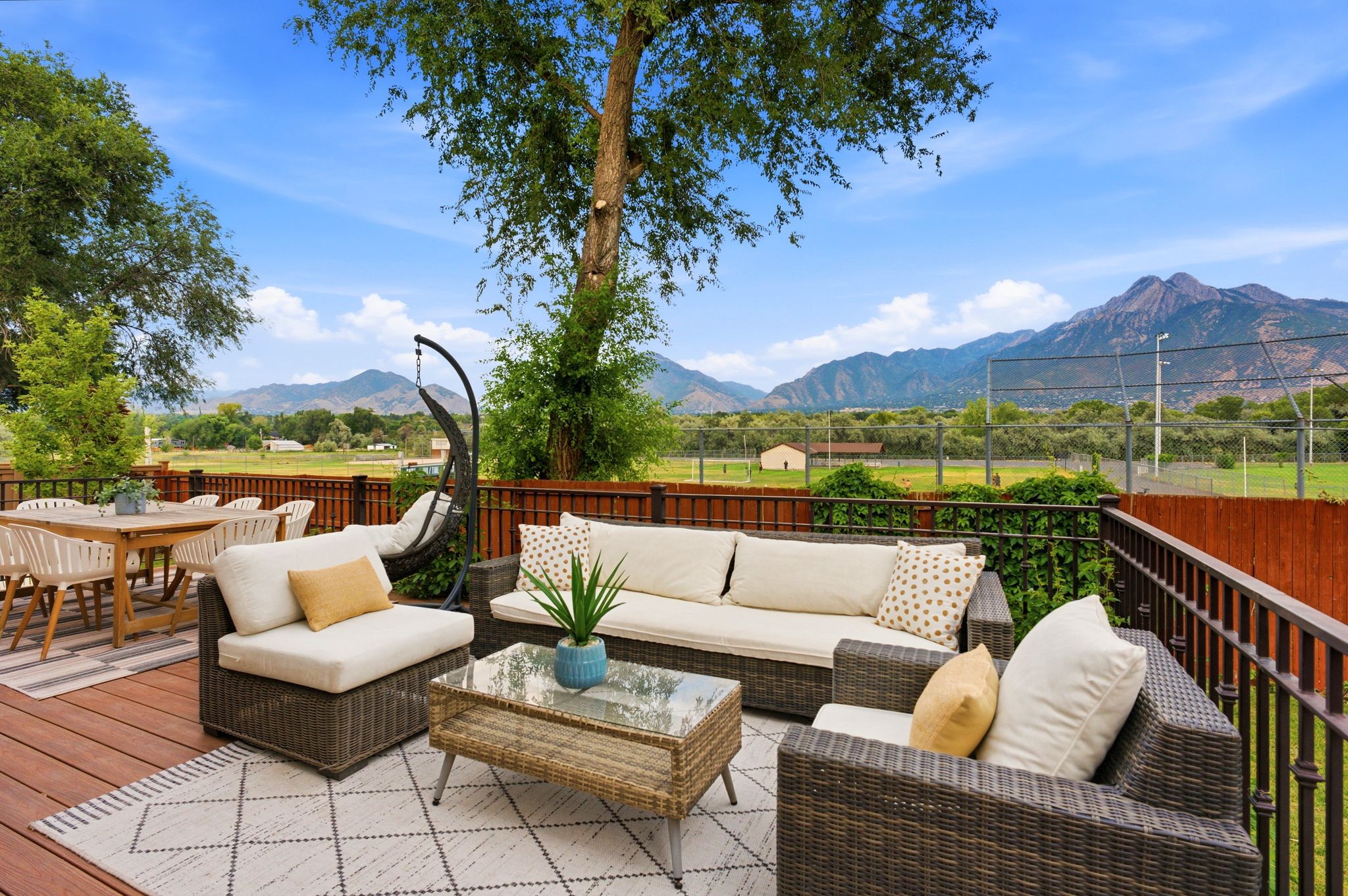 Expansive outdoor deck featuring wood-finish flooring