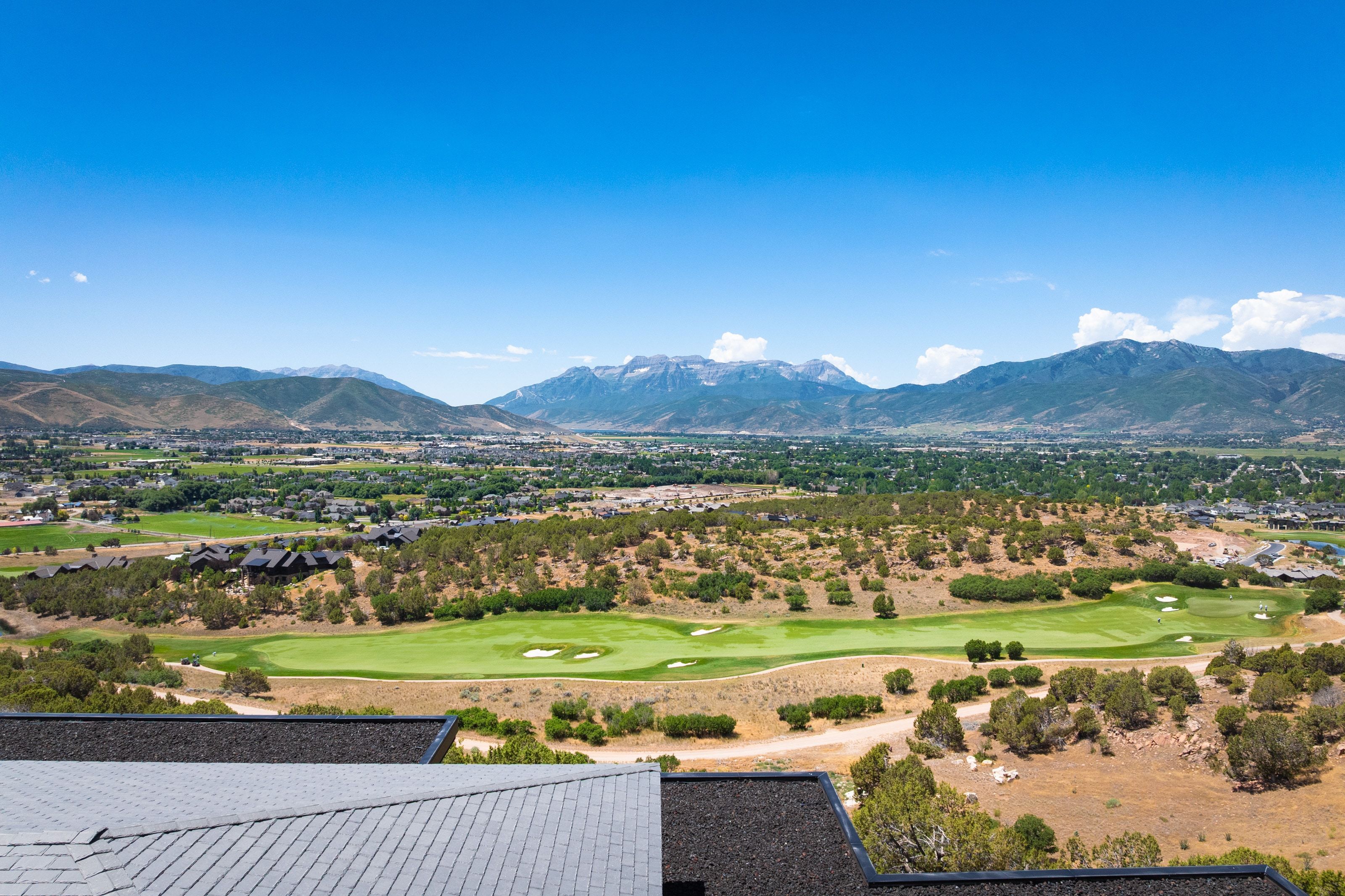 Expansive mountain range backdrop and valley scenery