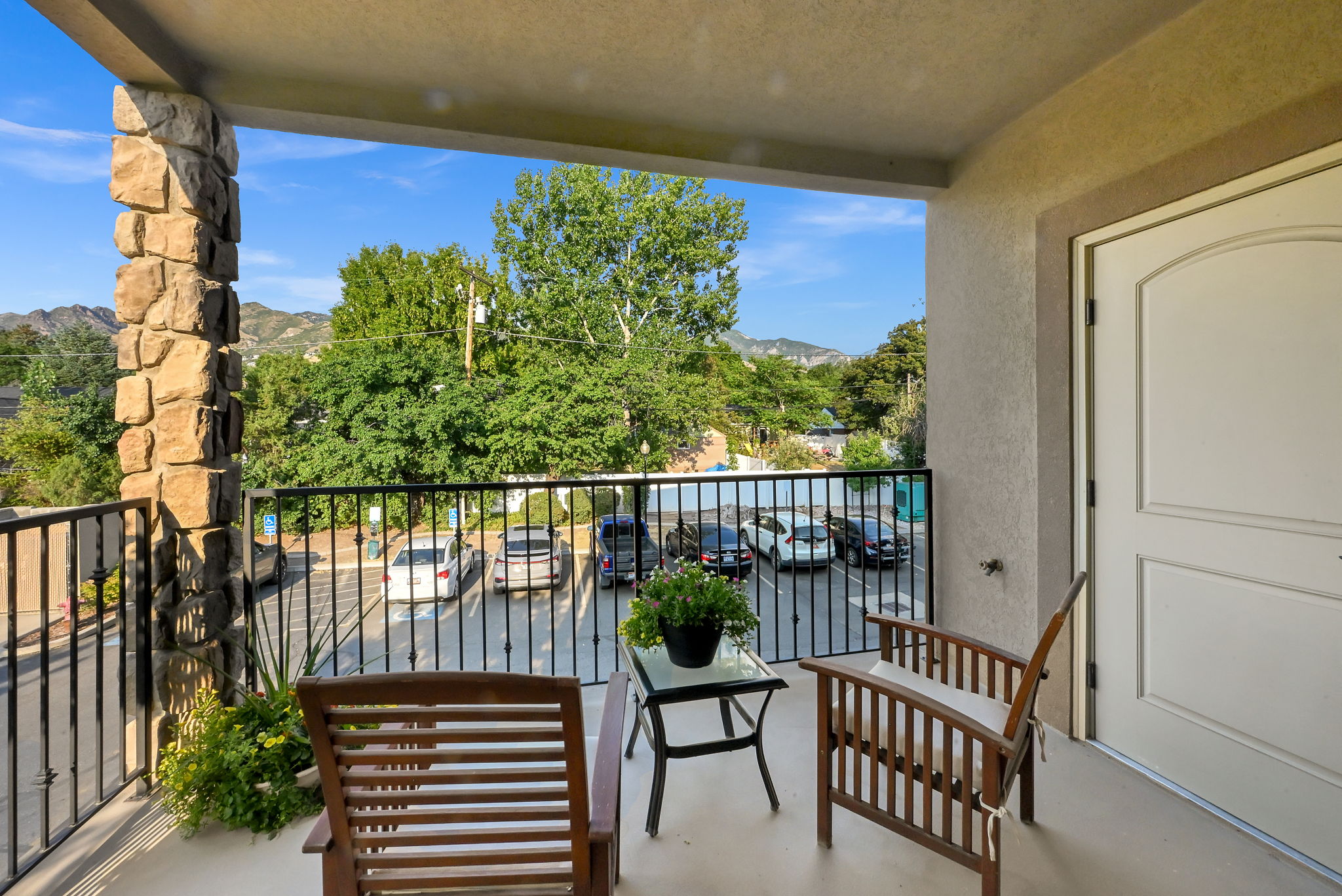 Private balcony with trees and mountain views