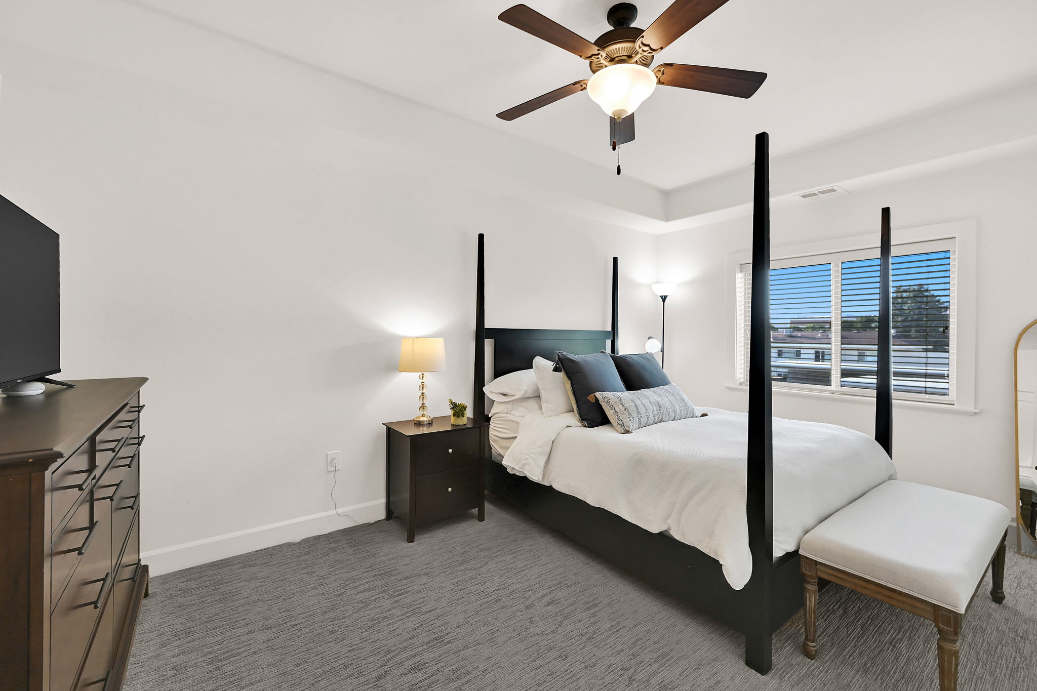 Primary Bedroom: Recessed ceiling with a contemporary ceiling fan and light fixture