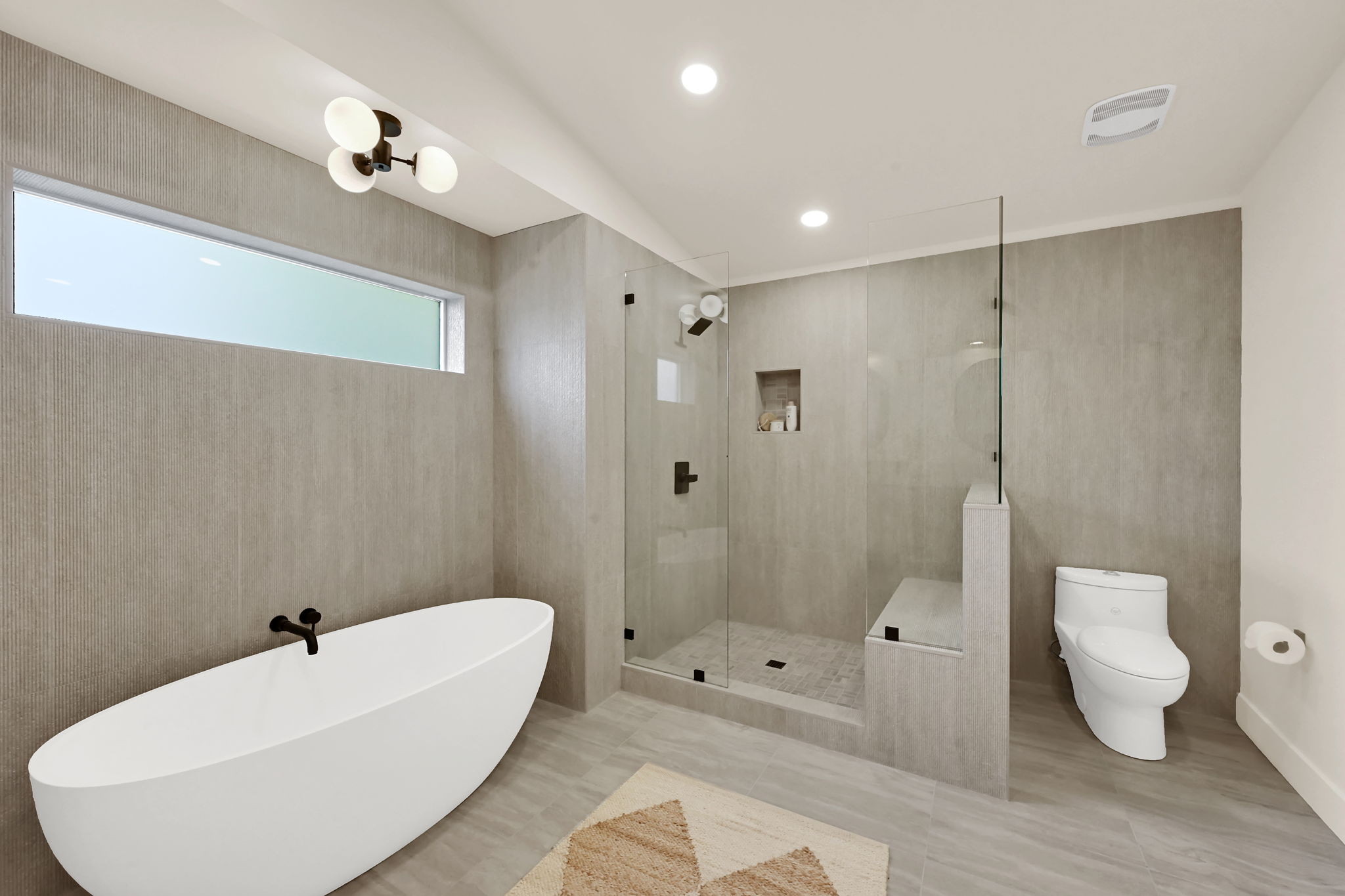 Primary bathroom with soaking tub and separate shower