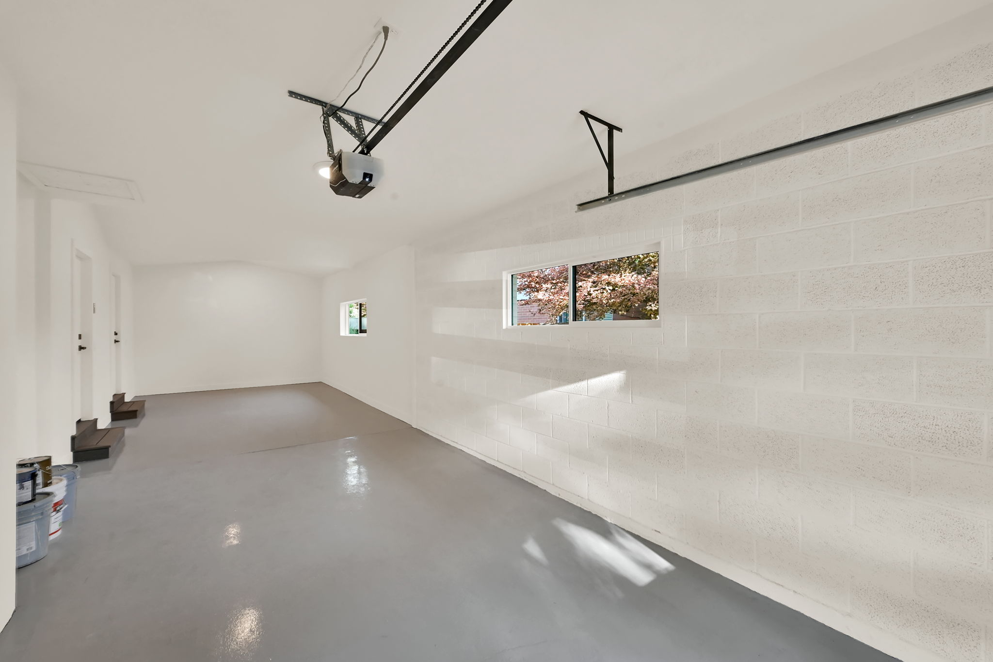 2- car tandem garage with extra length and a vaulted ceiling