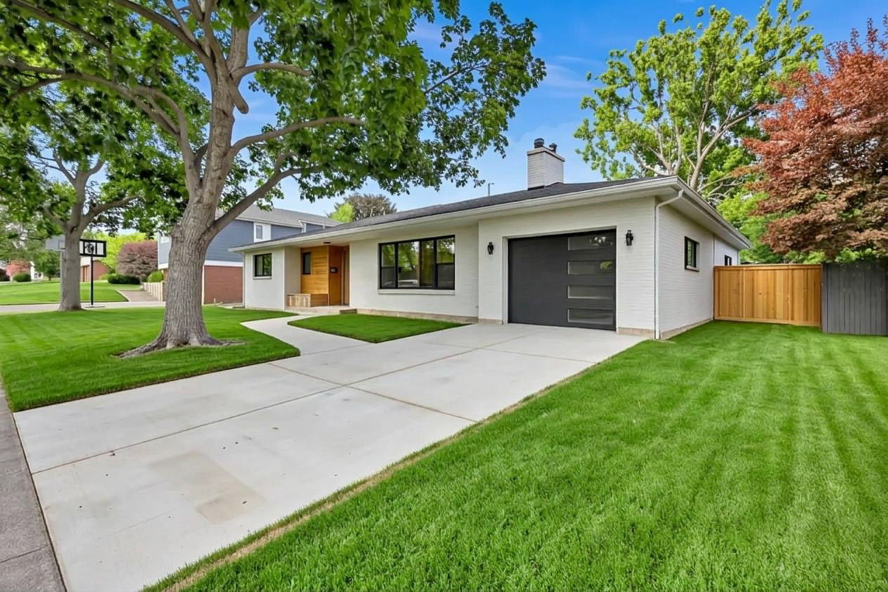 Contemporary residence with a white brick exterior