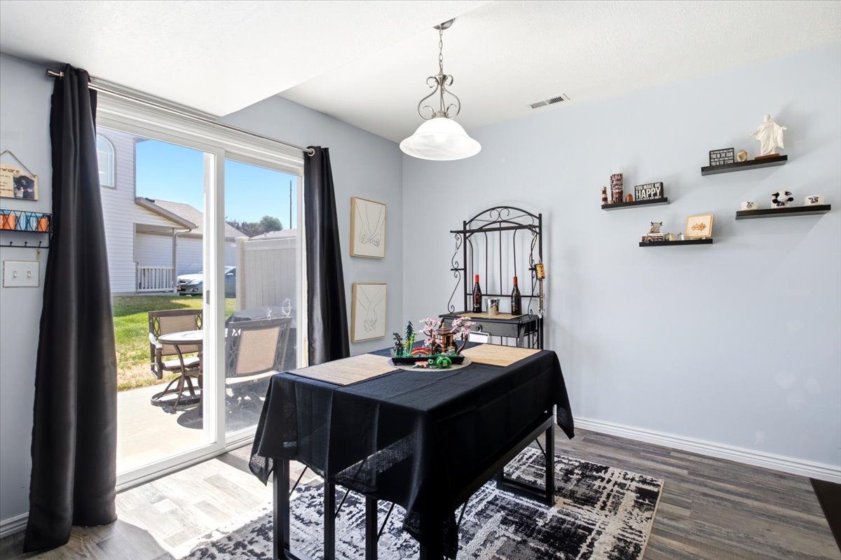 Sliding glass door opening to an outdoor patio area