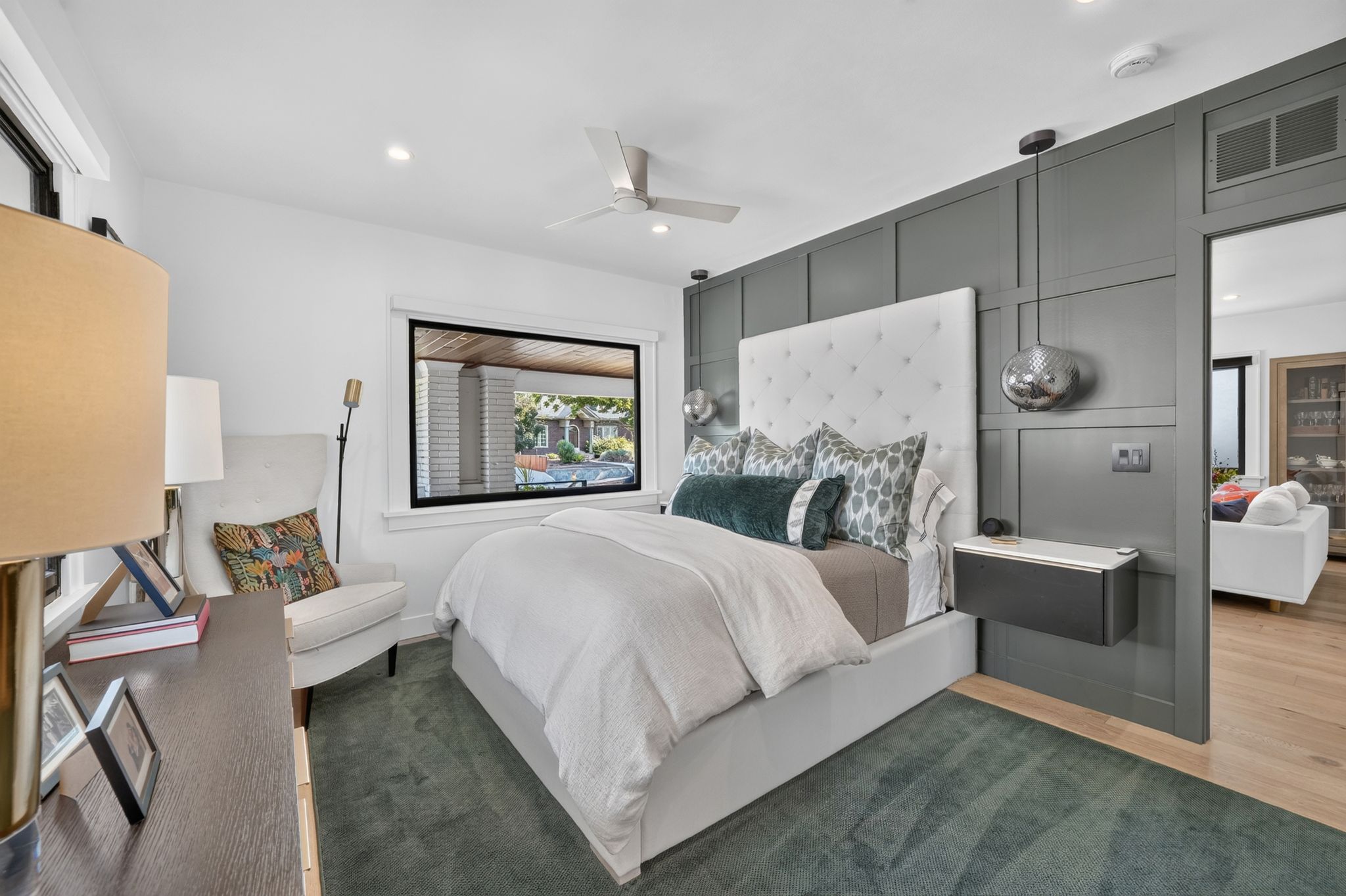 Bedroom featuring a board and batten accent wall, recessed lighting, and a ceiling fan