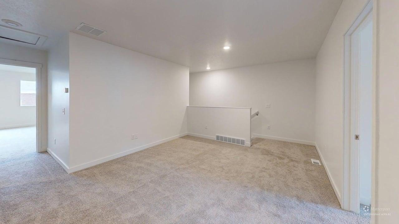 Carpeted bonus room with recessed lighting, white walls, and white trim