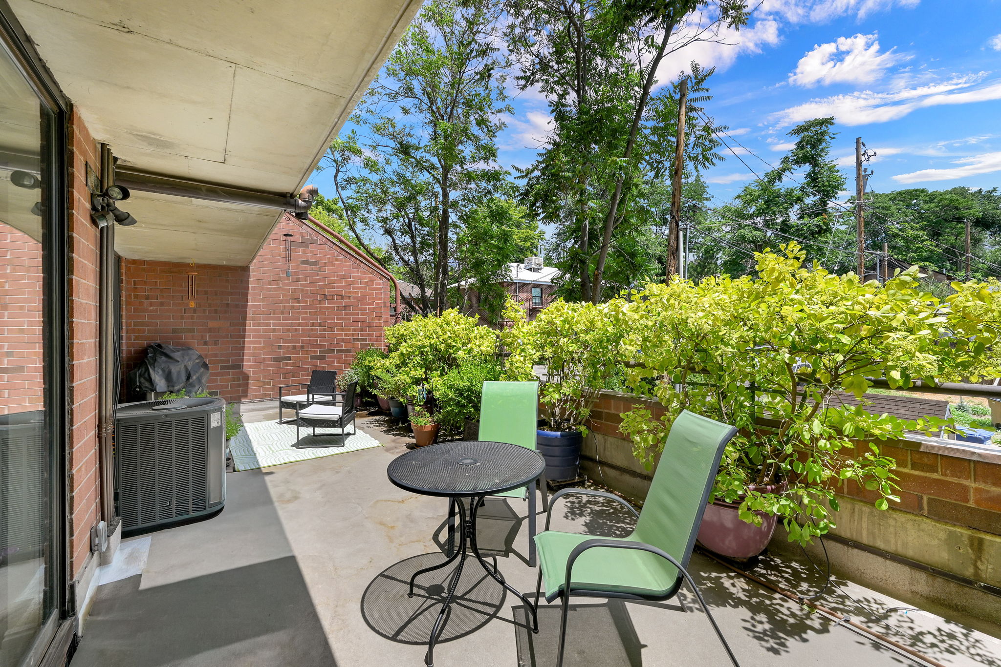 Outdoor patio area featuring a concrete surface