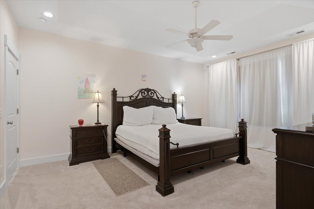Recessed lighting and ceiling fan overhead