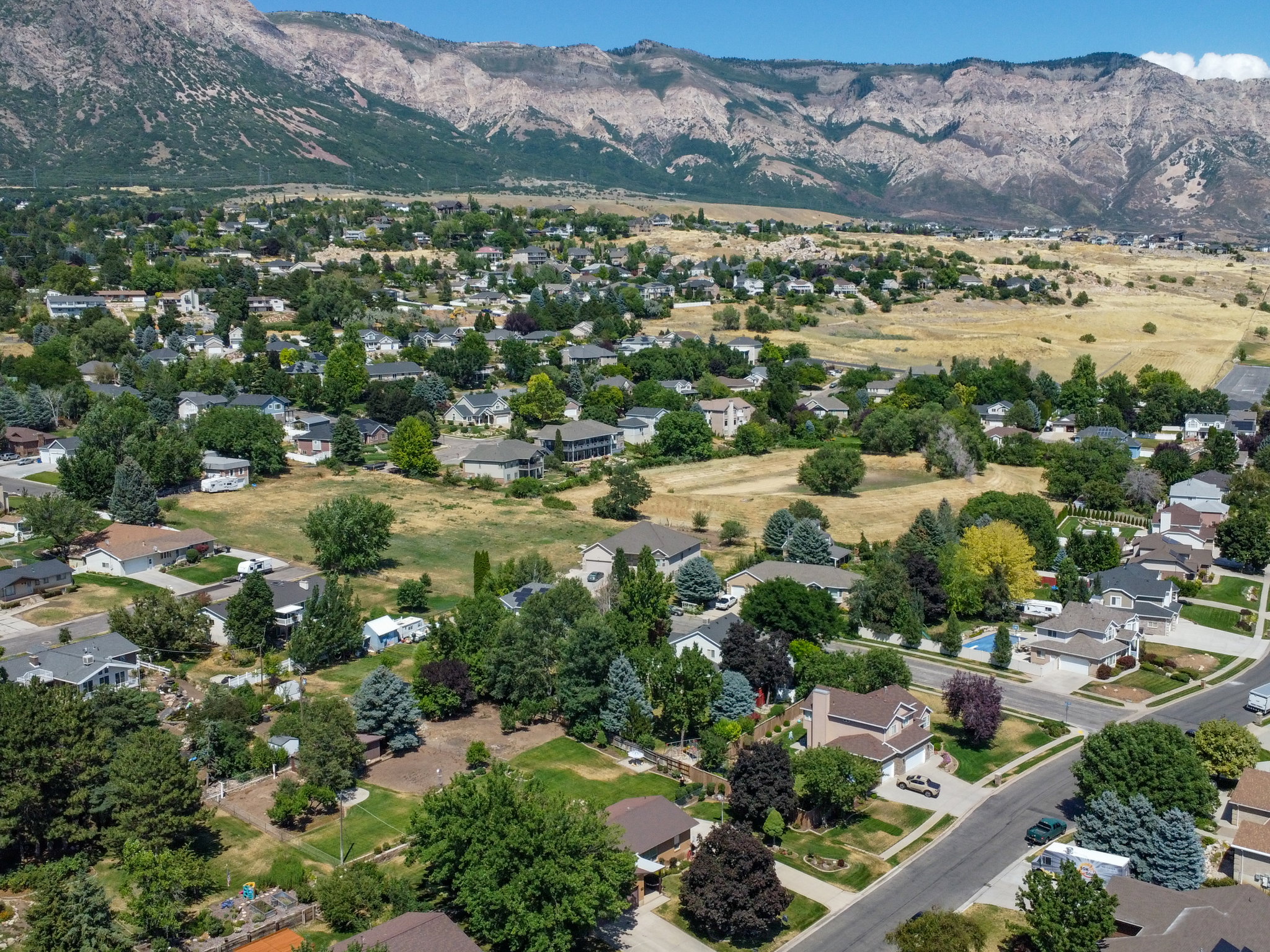 Expansive aerial capture showcasing a residential area with varied housing styles
